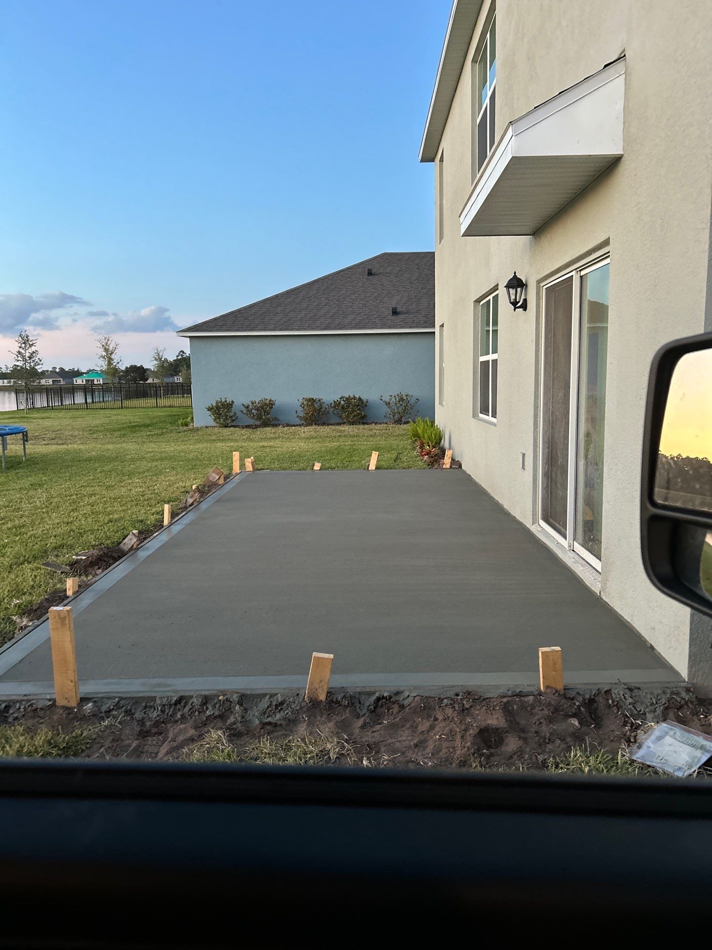 New concrete pad by Courtesy screening