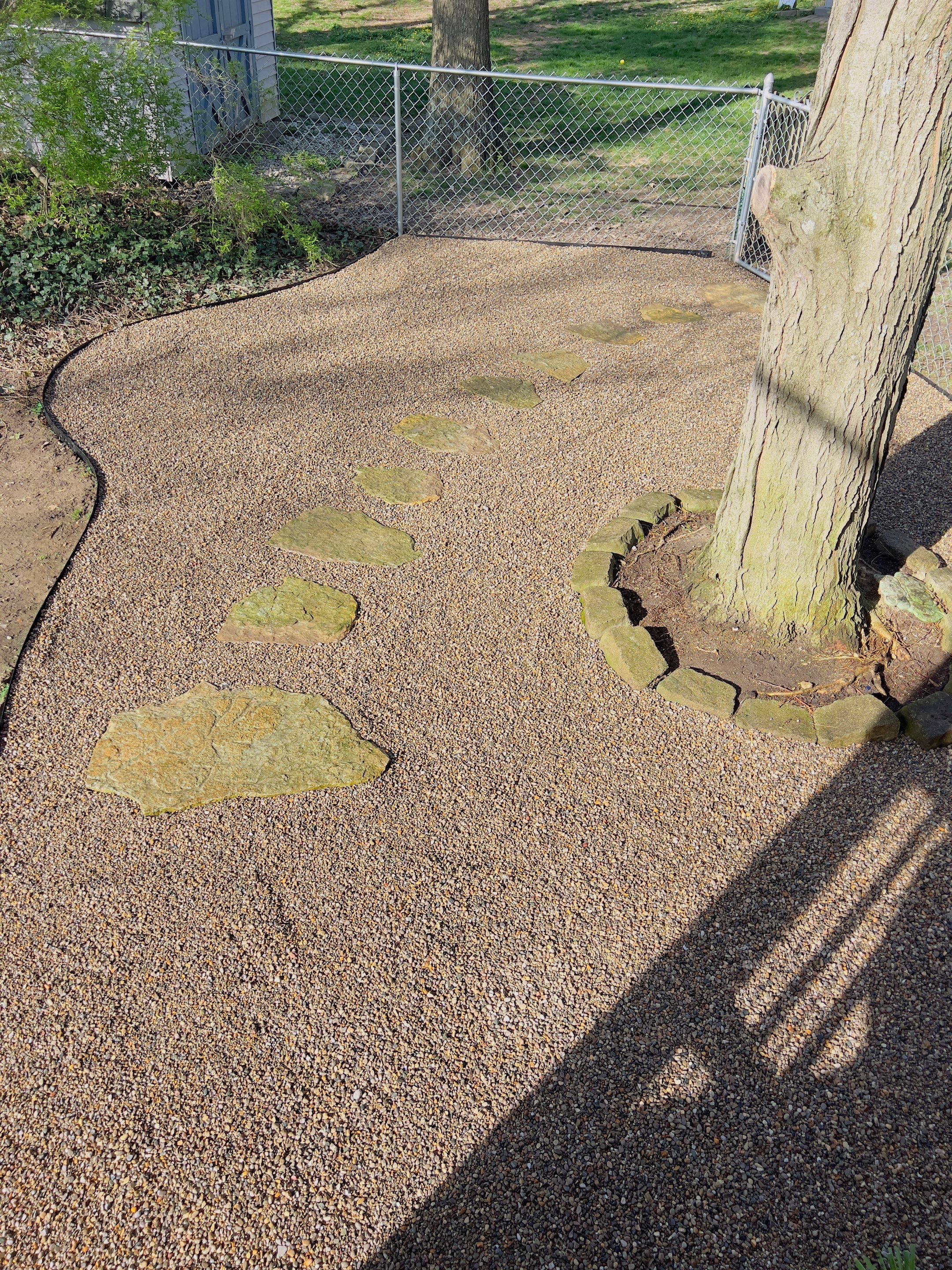 Pet Area & Stepper Path Installation  by Reisenberg’s Lawn & Landscape, LLC