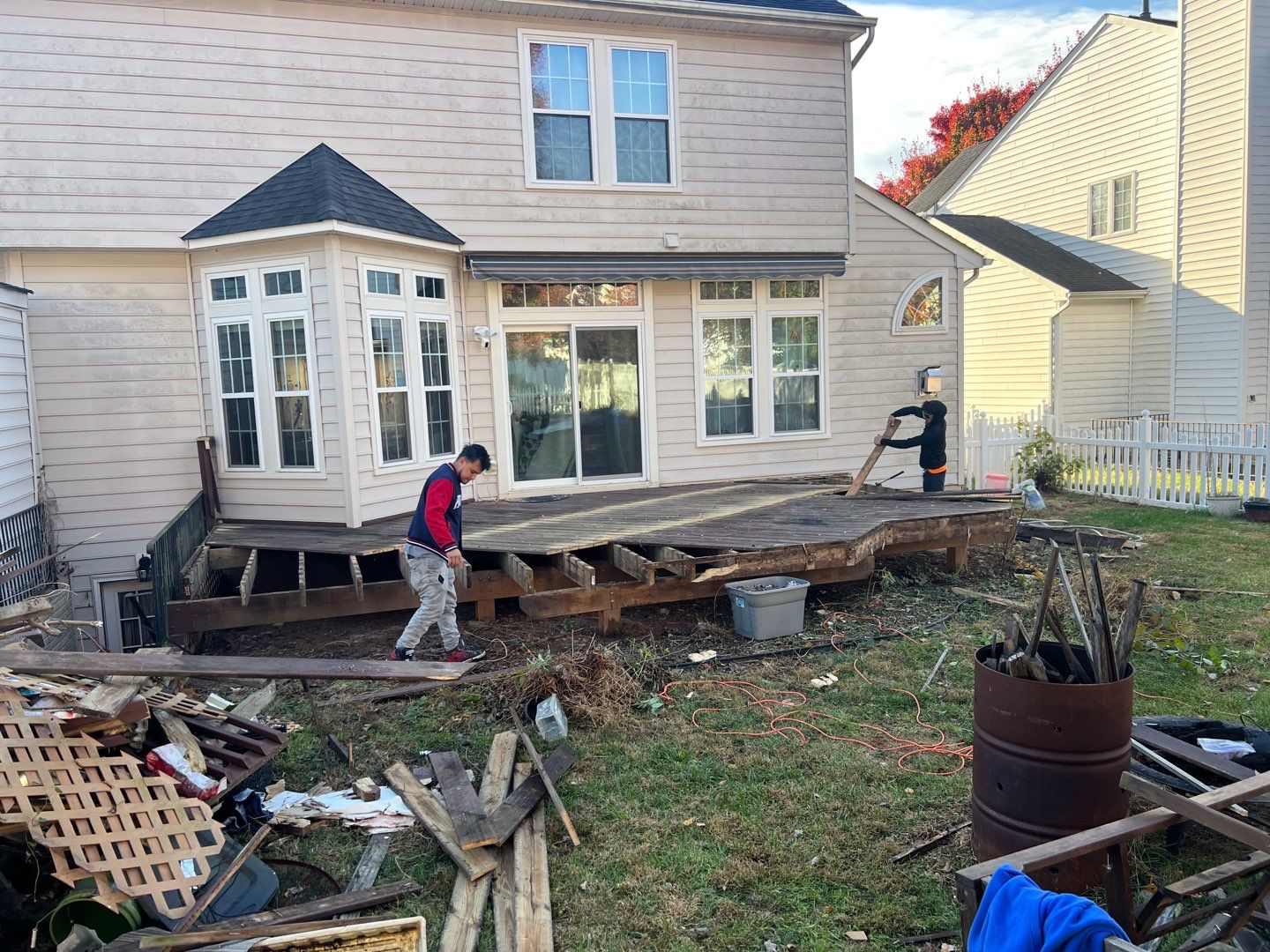 Custom Screened-In Porch with Stamped Concrete Patio in Warrenton by Jakari Restoration & Construction LLC