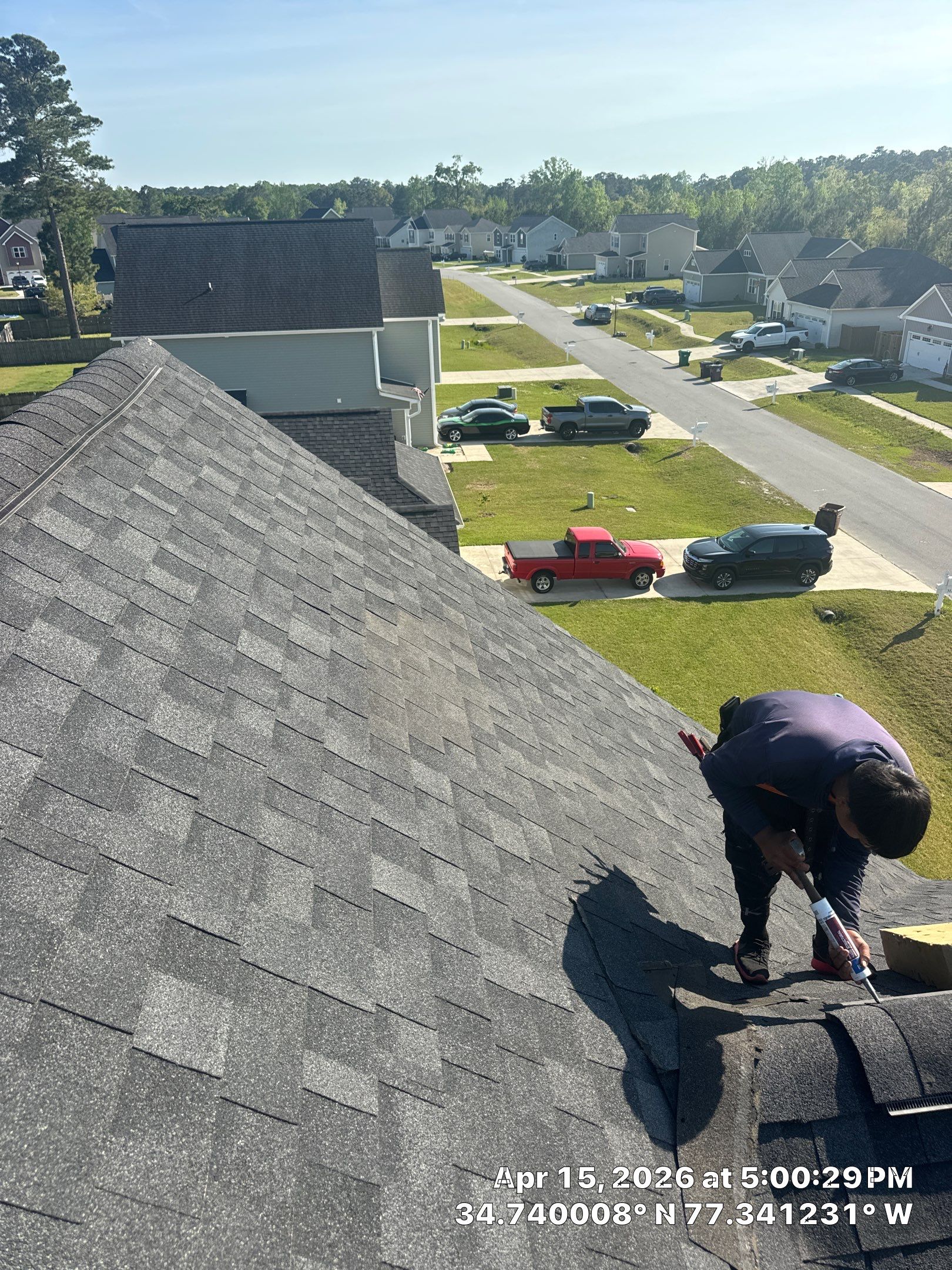 Excuse me ma'am - you're missing shingles! by North Carolina Roofs