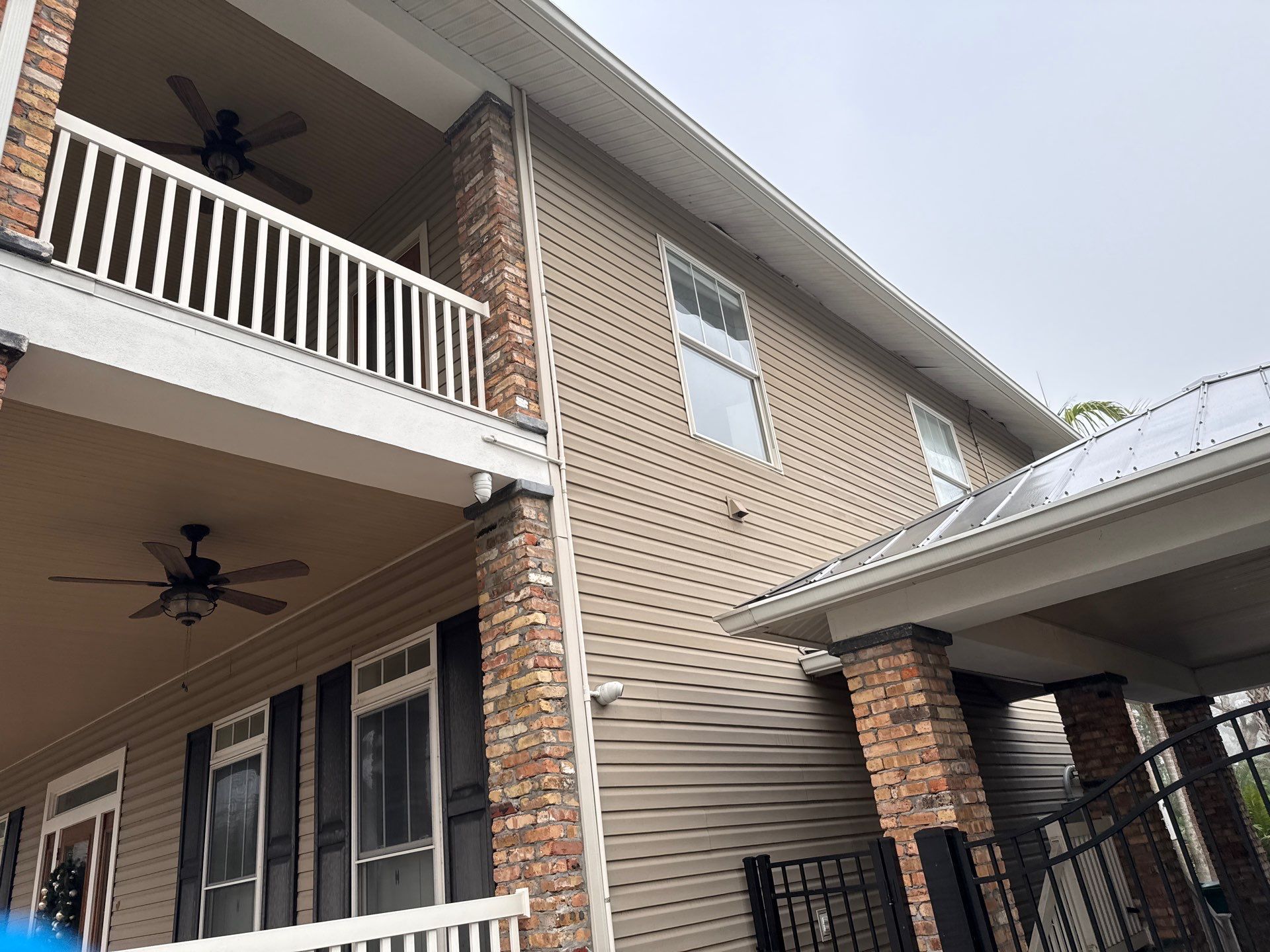 2-Story House Wash and Garage Pressure Washing in Palmetto, FL by Sunshine AquaWash