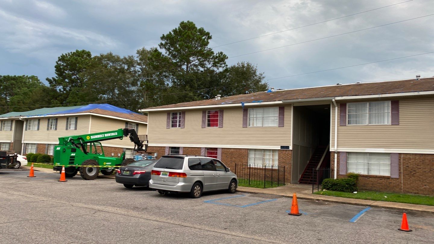 Commercial Roofing Installation using Roof Replacement by American Roofing & Construction LLC