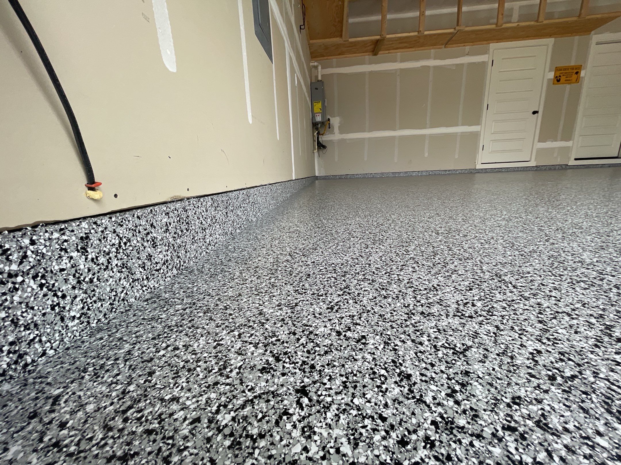Garage Transformation using Domino by Croc Coatings, LLC