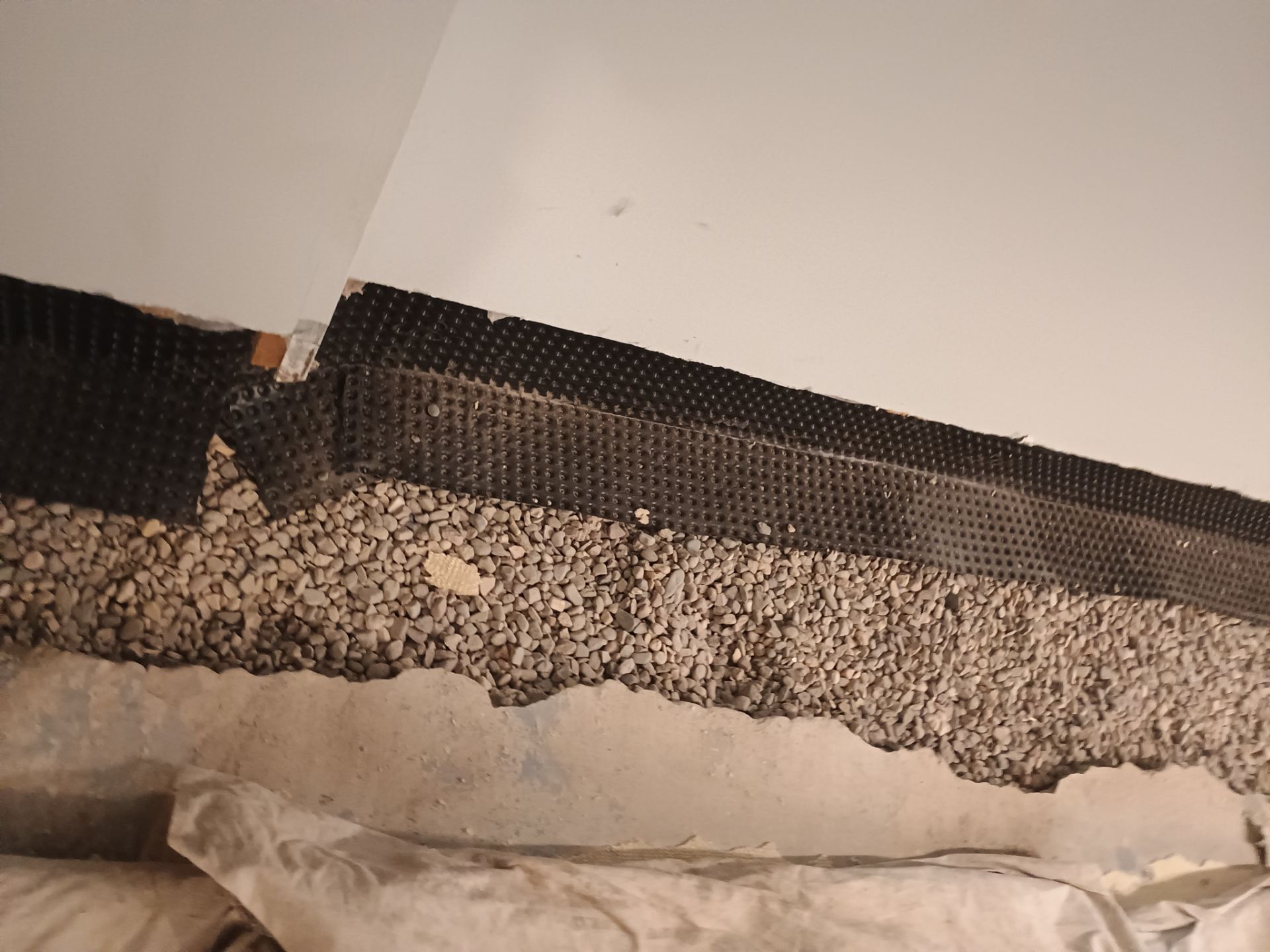 Interior Drain Tile Installation in South Minneapolis by Waterproofing Northeast