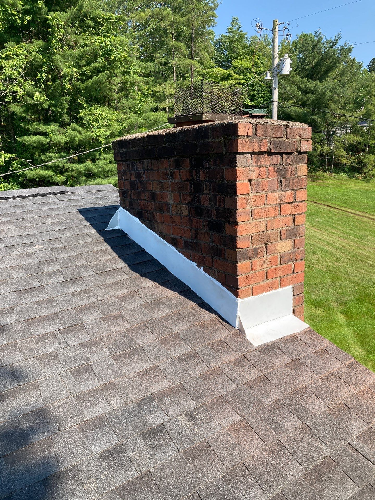 Residential Roofing Installation using GAF Timberline HDZ Charcoal by Rainstoppers Roofing