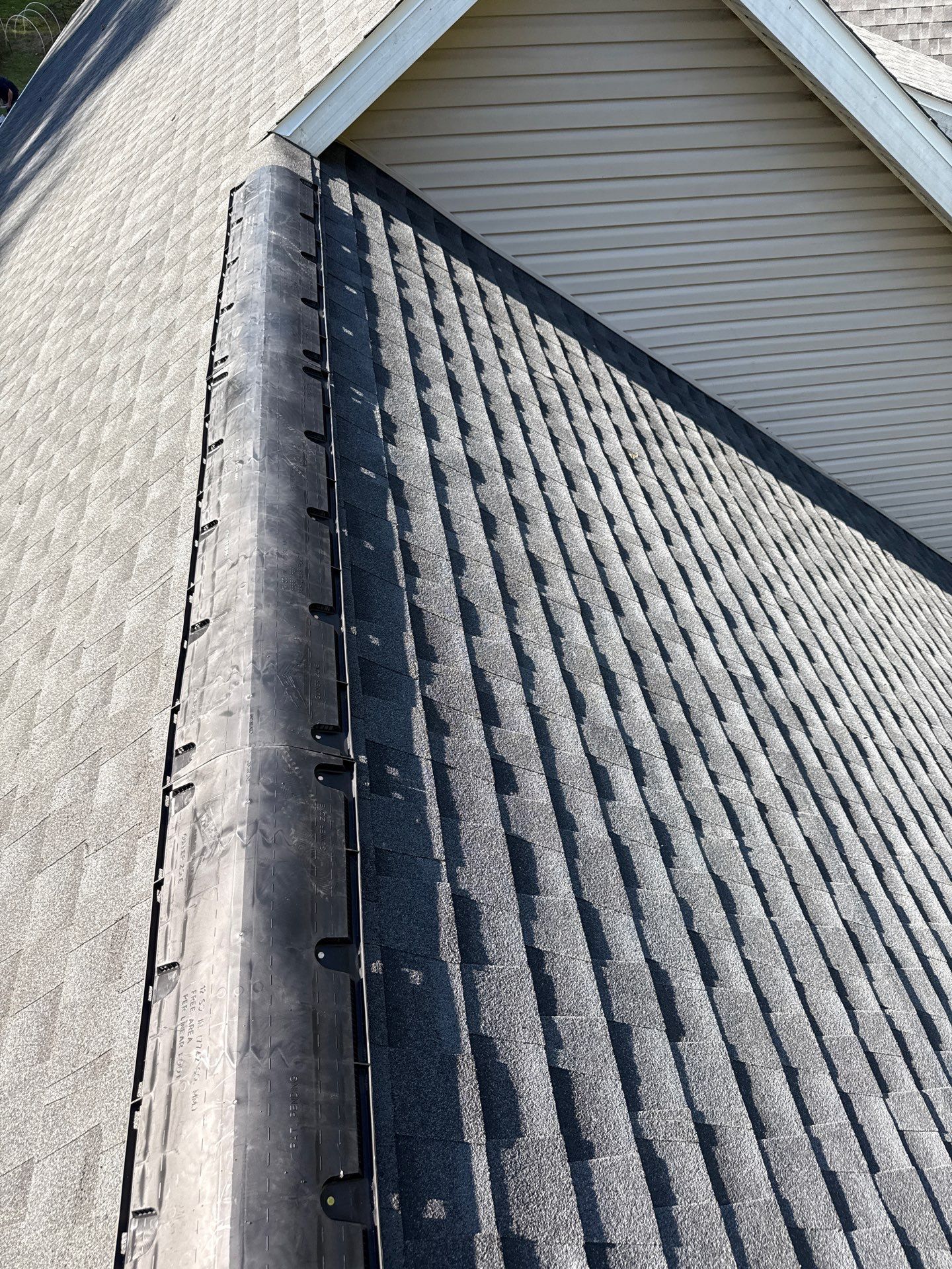 Residential Roofing Installation using GAF Timberline HDZ Charcoal by Rainstoppers Roofing