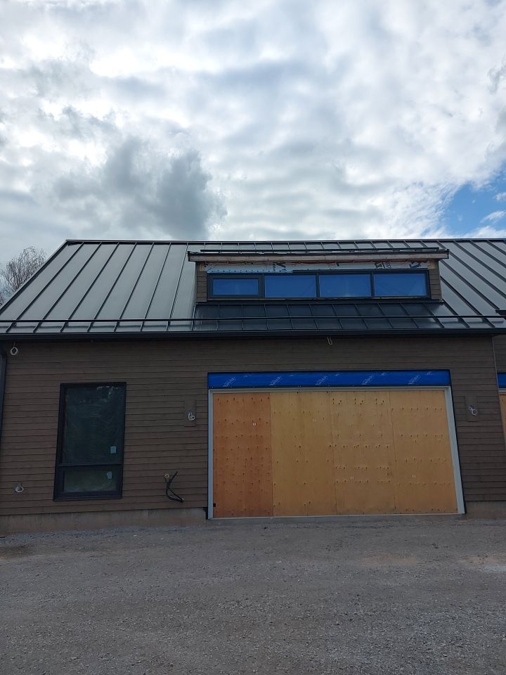 New Home Construction using 16" Standing Seam Panels by Jay Carter Roofing & Sheet Metal