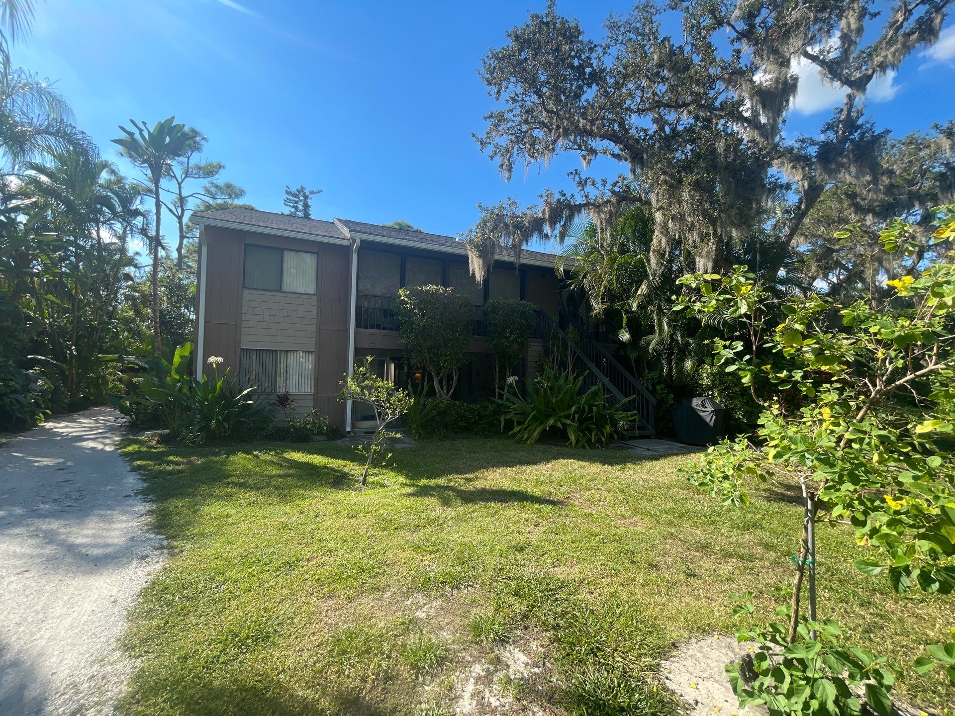Clean Gutters and Roof in Sarasota FL by Gutter Professors