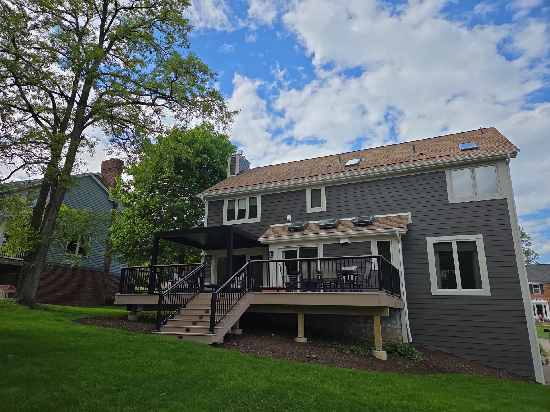 Full exterior remodel by Cousins Roofing Siding & Decks