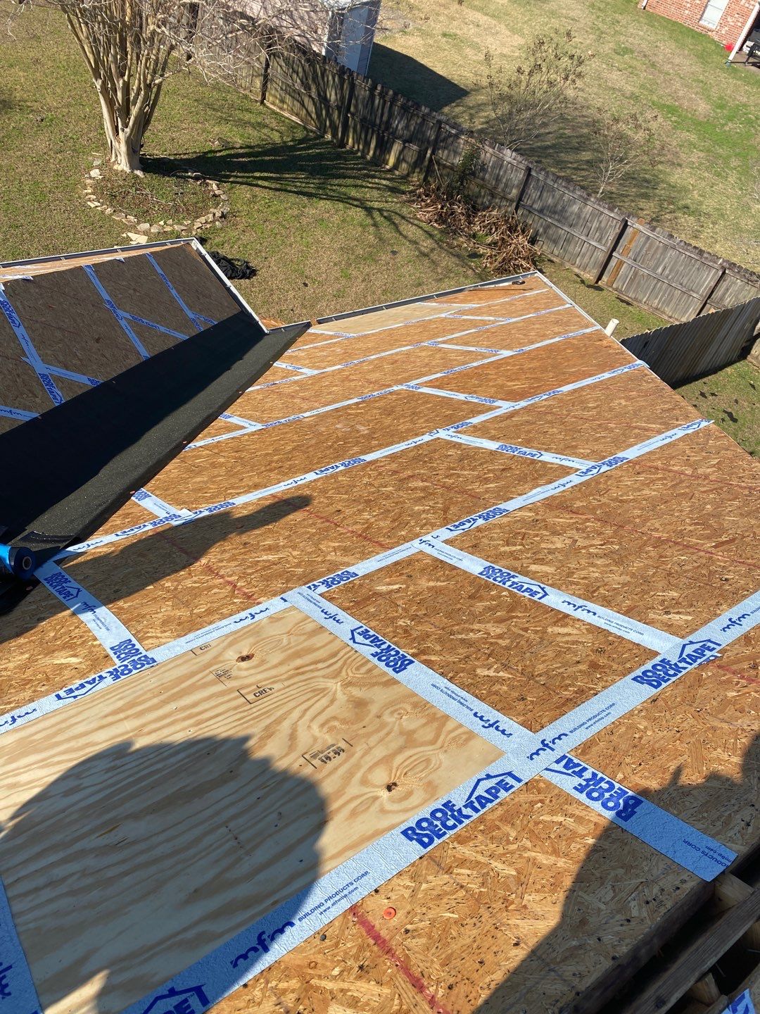 Residential Roofing Installation using Roof Replacement by American Roofing & Construction LLC