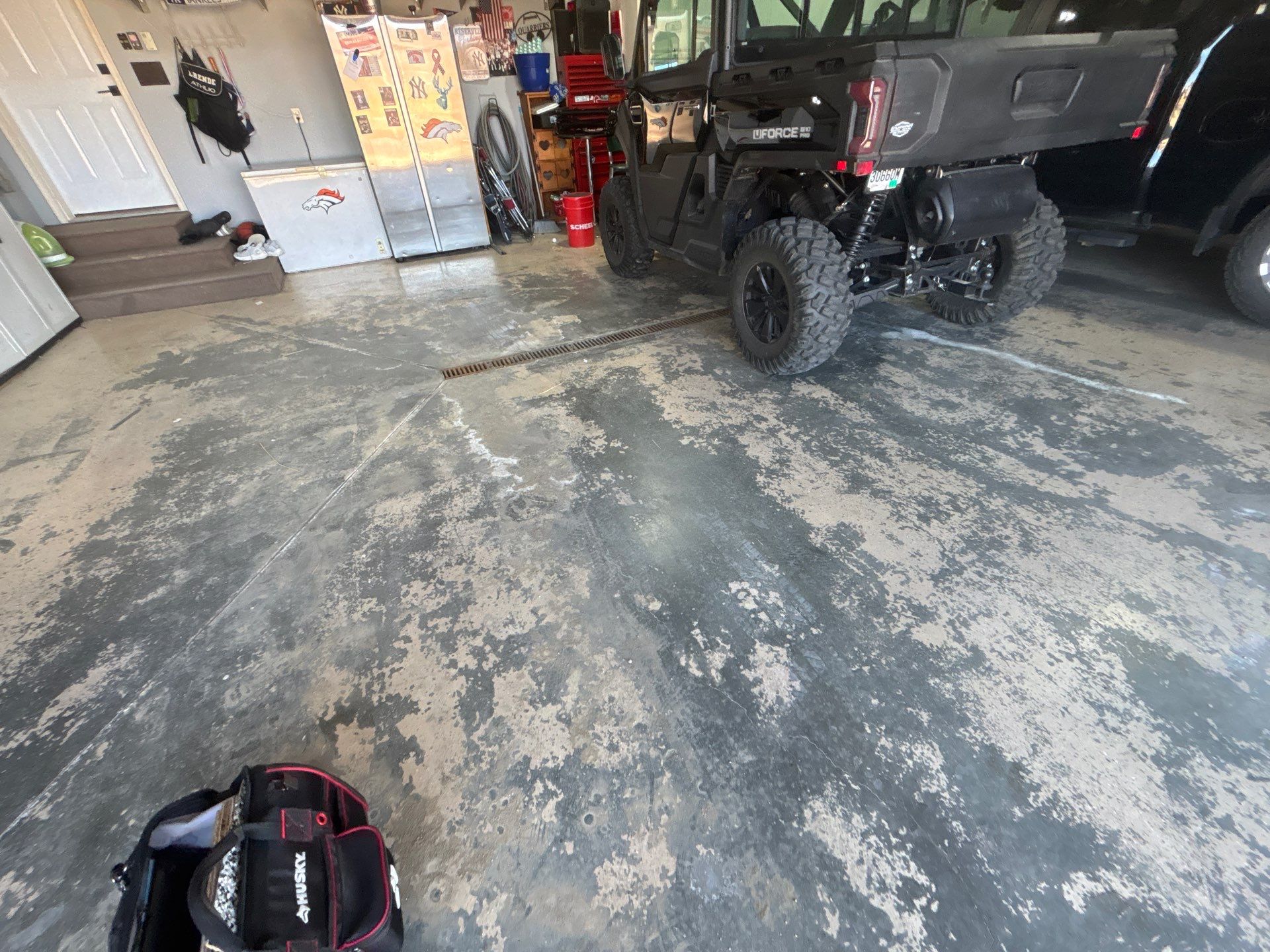 Full Garage Floor Epoxy Coating Installation in Dell Rapids by Select Painting, Coatings & Garage Cabinets