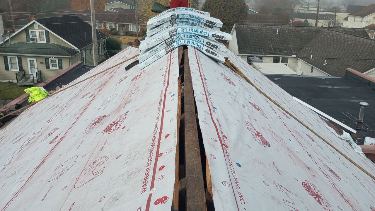 Commercial Roofing Installation using Performance Shingles by Mr. Roofer