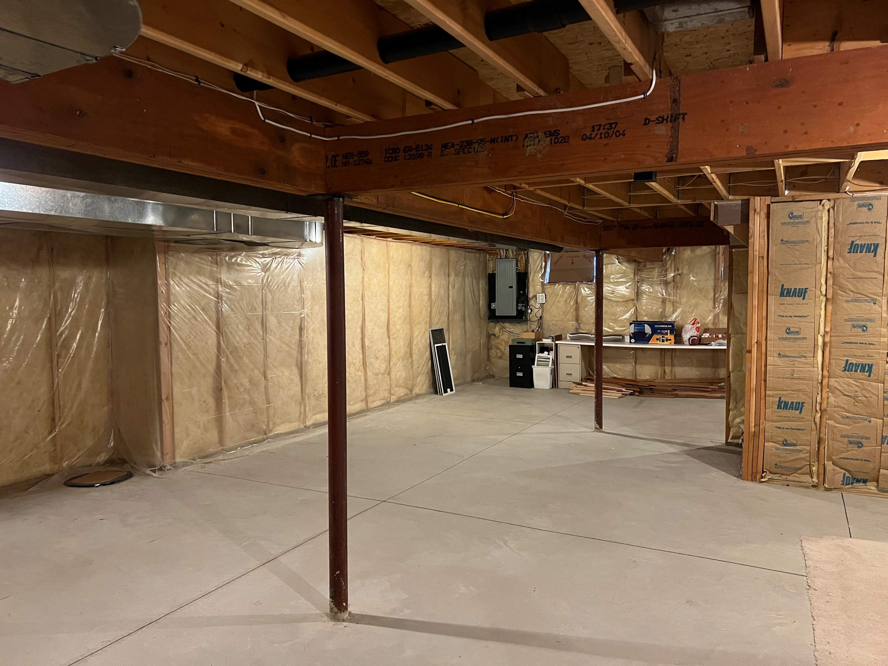 Basement Remodel w/ LVP Flooring & Exposed Ceiling by Chagnon Building & Remodeling LLC