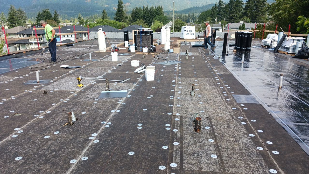 Residential ReRoofing Installation using IKO 2ply sbs  by Top Notch Roofing Inc