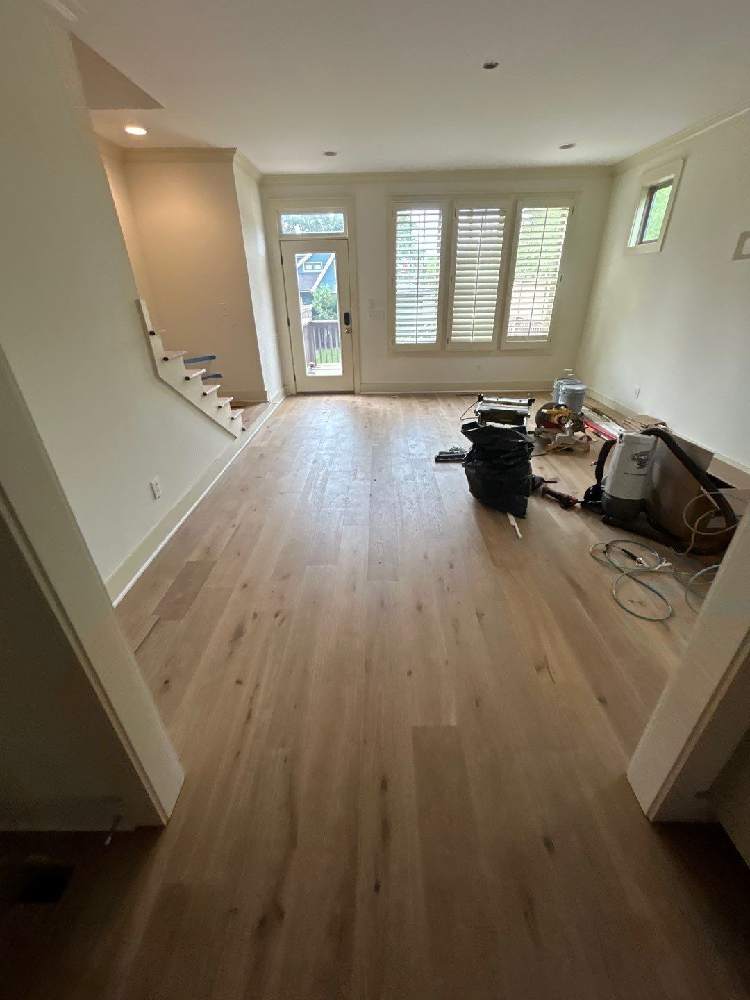 White Oak Hardwood and Checkerboard Tile Installation by Footprints Floors of Nashville