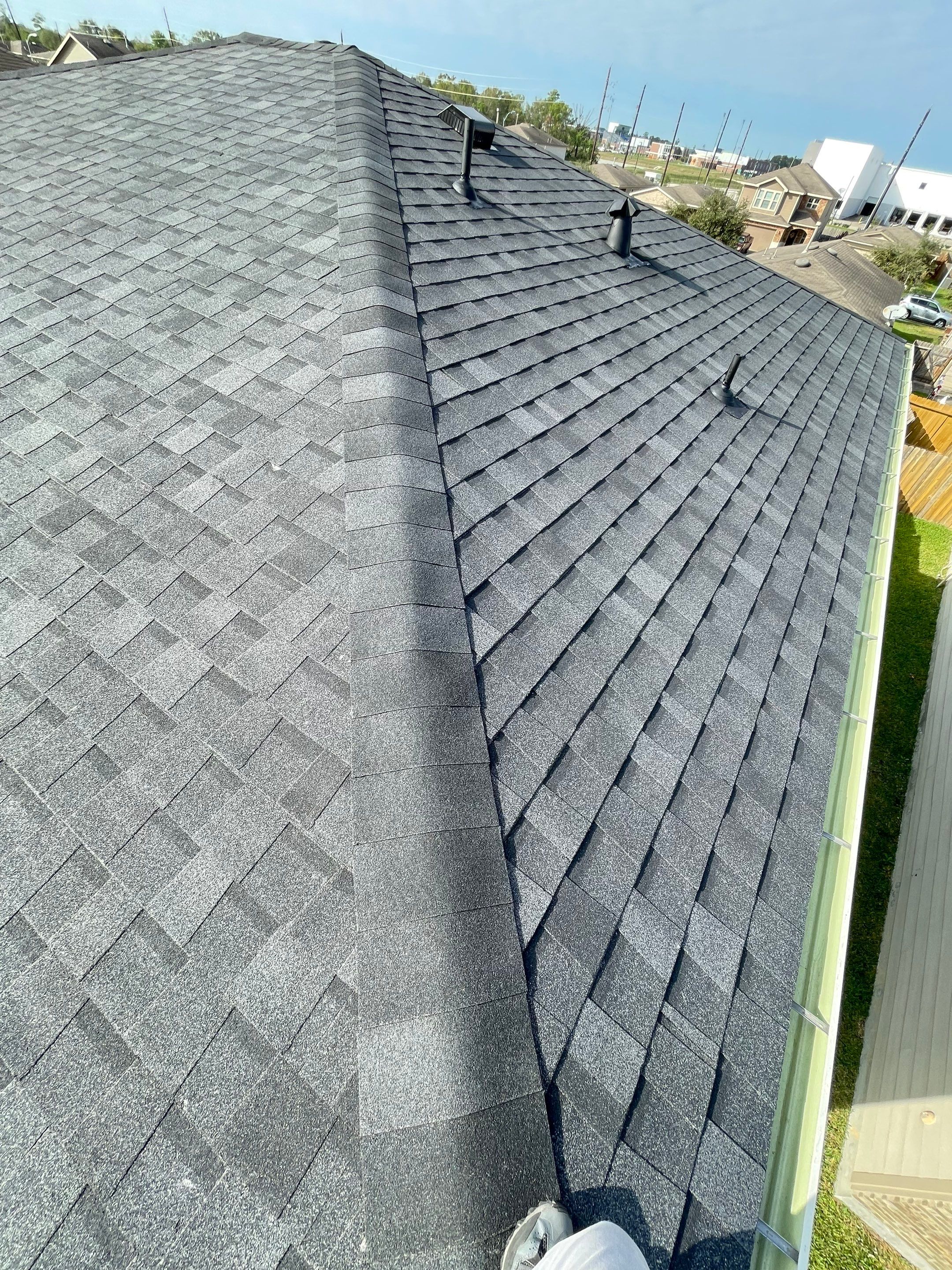 Residential Roofing Installation using Atlas ProLam® Shingles Black Shadow Color by CAP Roofing and Construction LLC