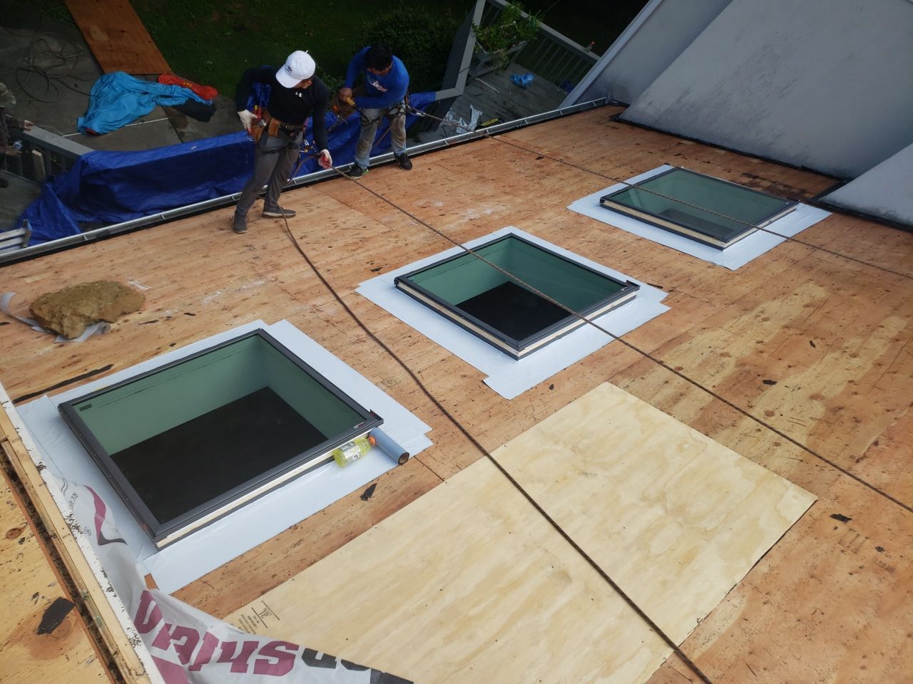 Skylight, Roof, and Gutter Replacement by American Home Contractors