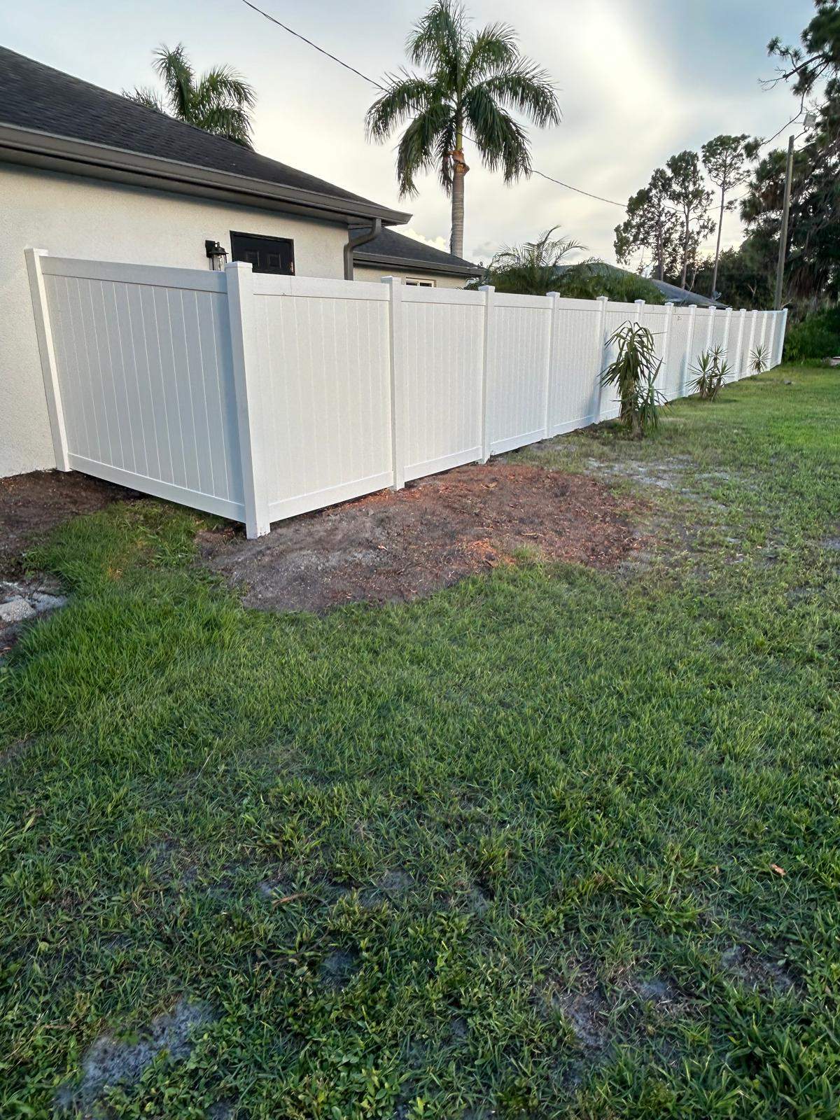 White Vinyl Privacy Fence and Chain Link Installation in North Port by True Fence LLC