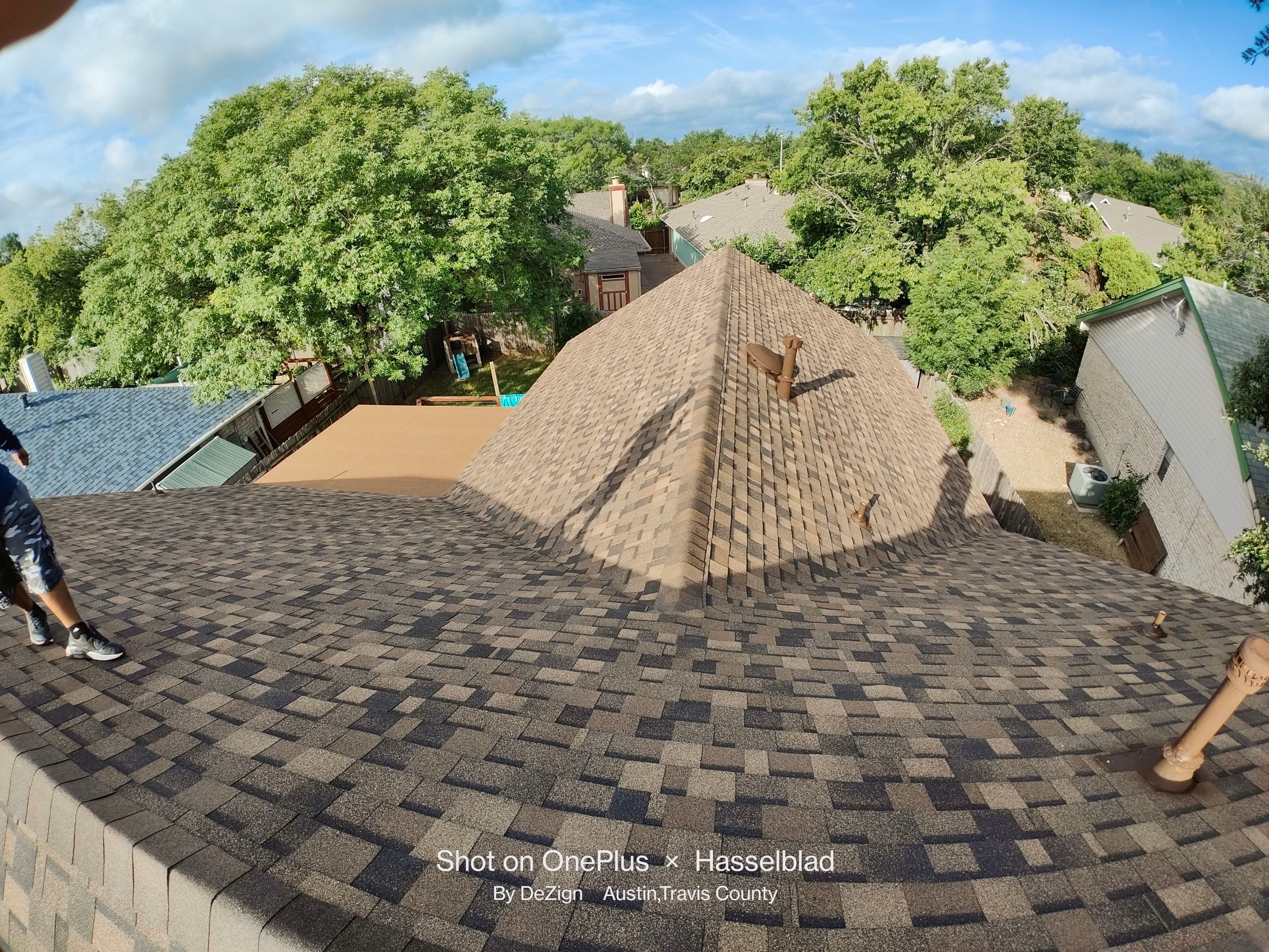 New Roof Installation Of IKO Dynasty Color Brownstone by DeZign Roofing & Exteriors