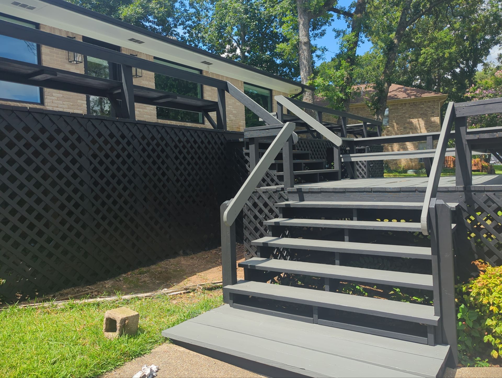 Lake House Deck Restaining in Flint, Texas by Quality Coats Painting