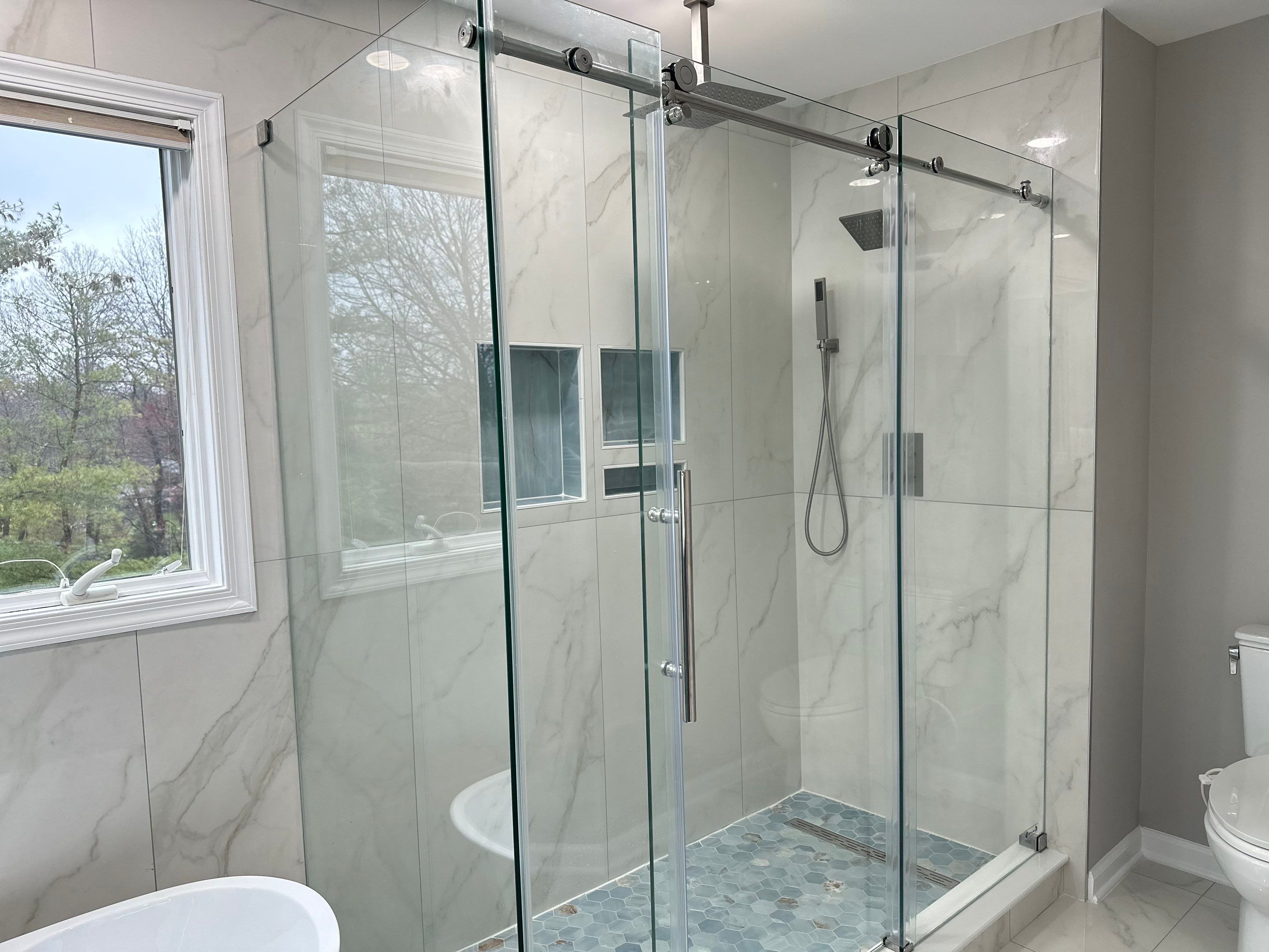 Bathroom Remodel using Tile by Home Concepts Construction