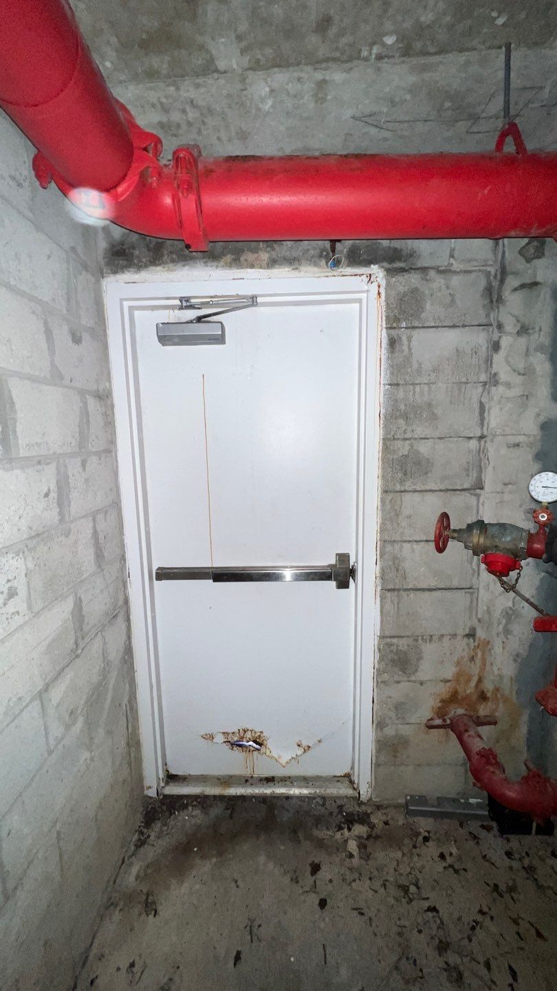 Commercial Stairwell Door Replacement & Hollow Metal Door Retrofit – Pompano Beach High-Rise by The Door Doctor of South Florida, Inc.