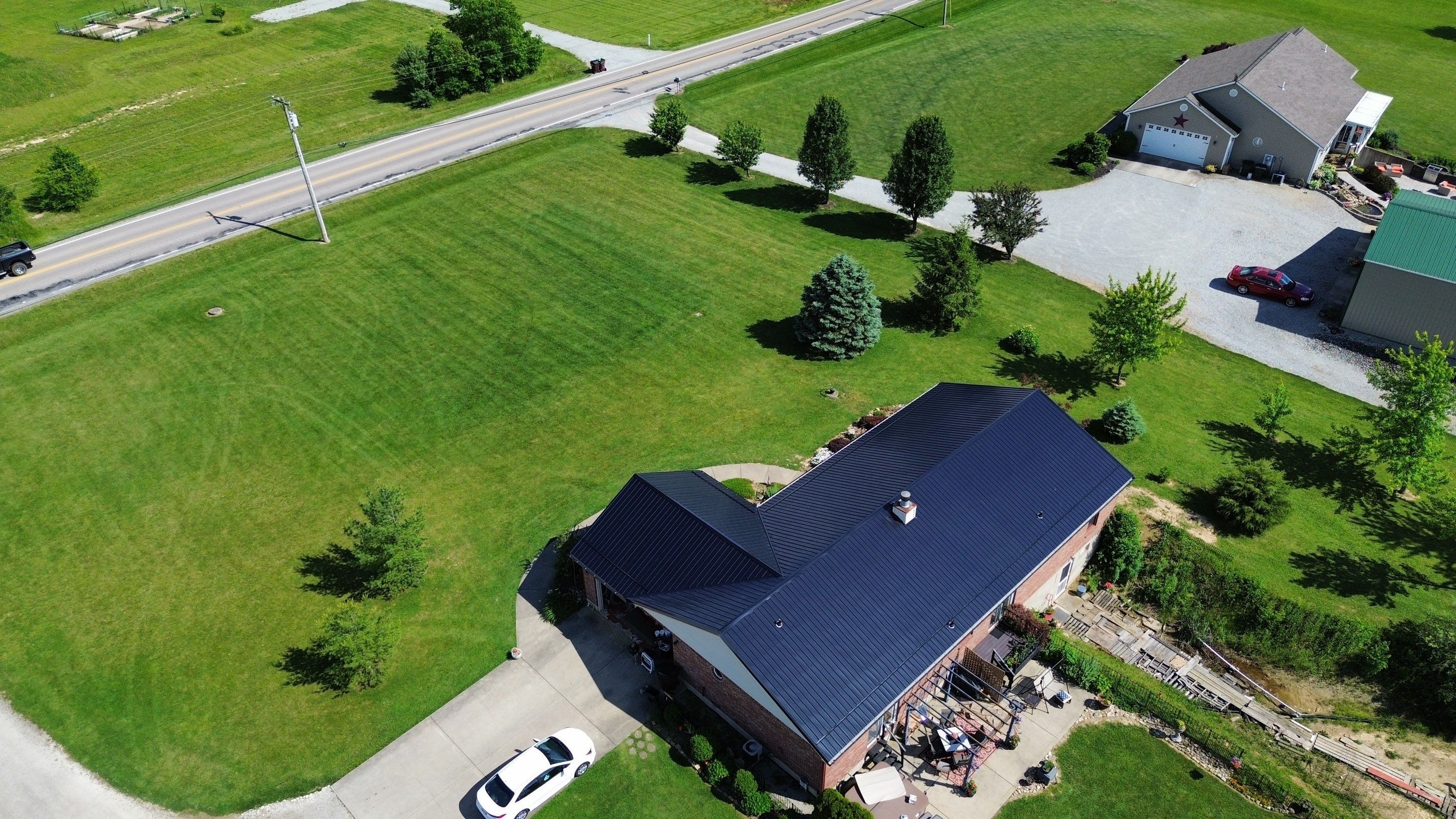 Residential Roofing Installation using Perfromance Panel Metal - Black by RoofX 
