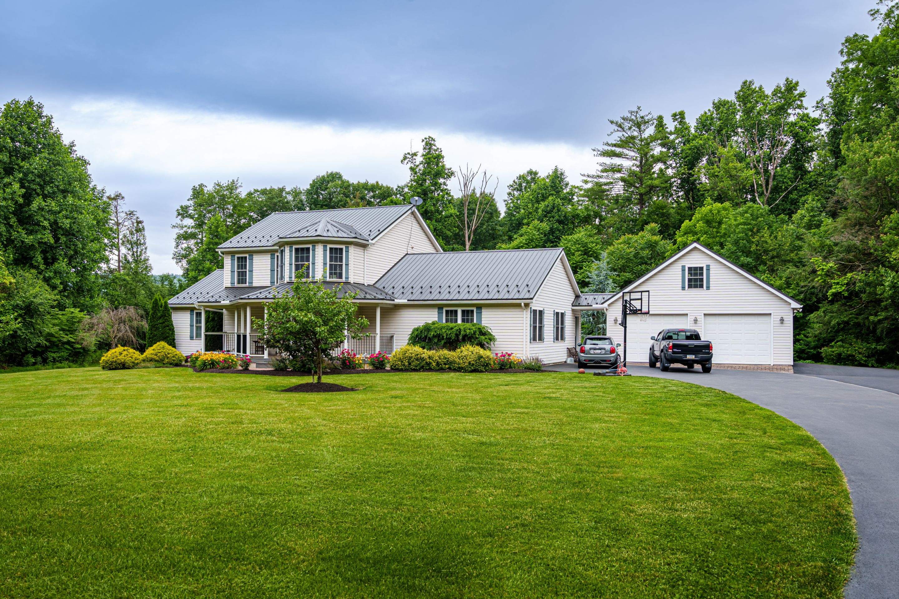 Metal roof install- shadow gray by Esh Builders
