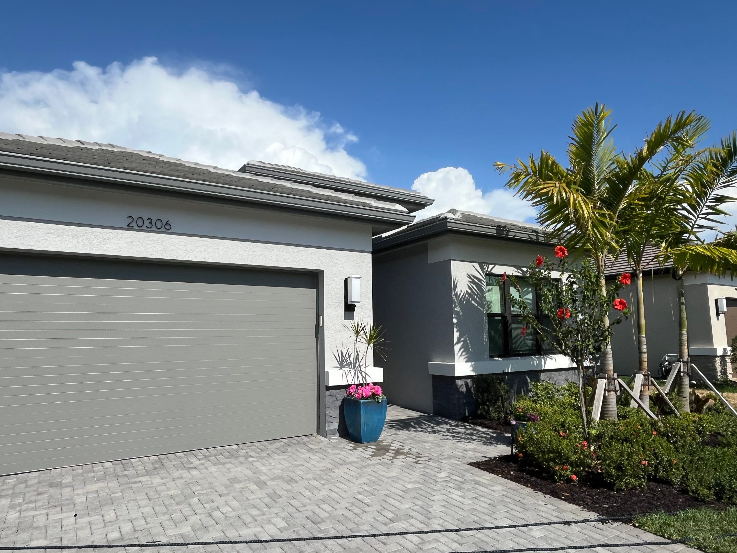 Grey Seamless Gutter Installation in Estero FL by Gutter Professors