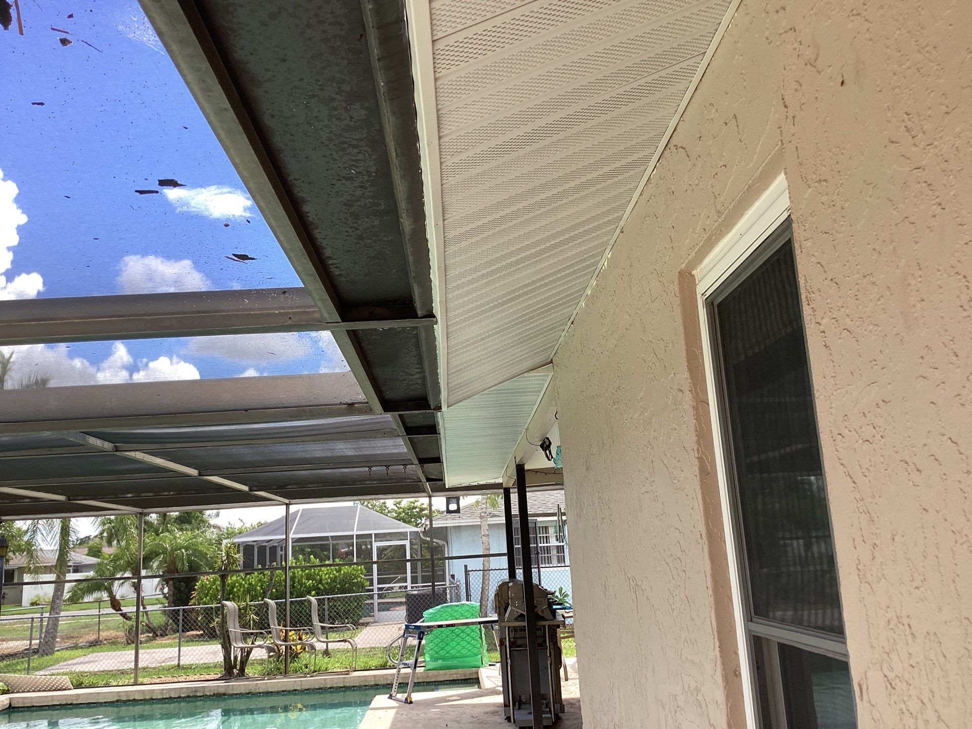 White Seamless Gutters and Splash Guards in Fort Myers FL by Gutter Professor by Gutter Professors