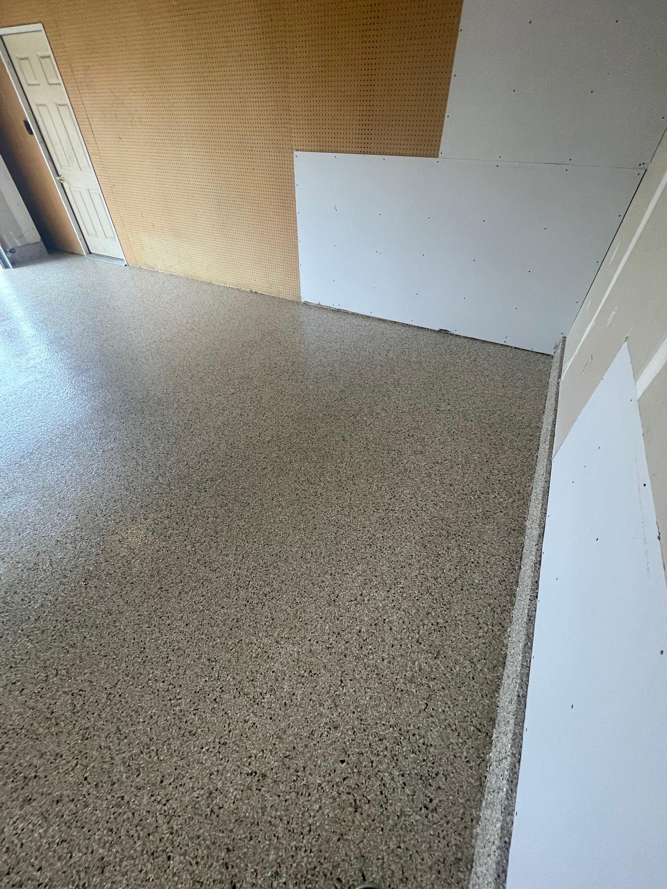 Speckled Epoxy Floor Coating Installation for Centerville Residential Garage by Select Painting, Coatings & Garage Cabinets