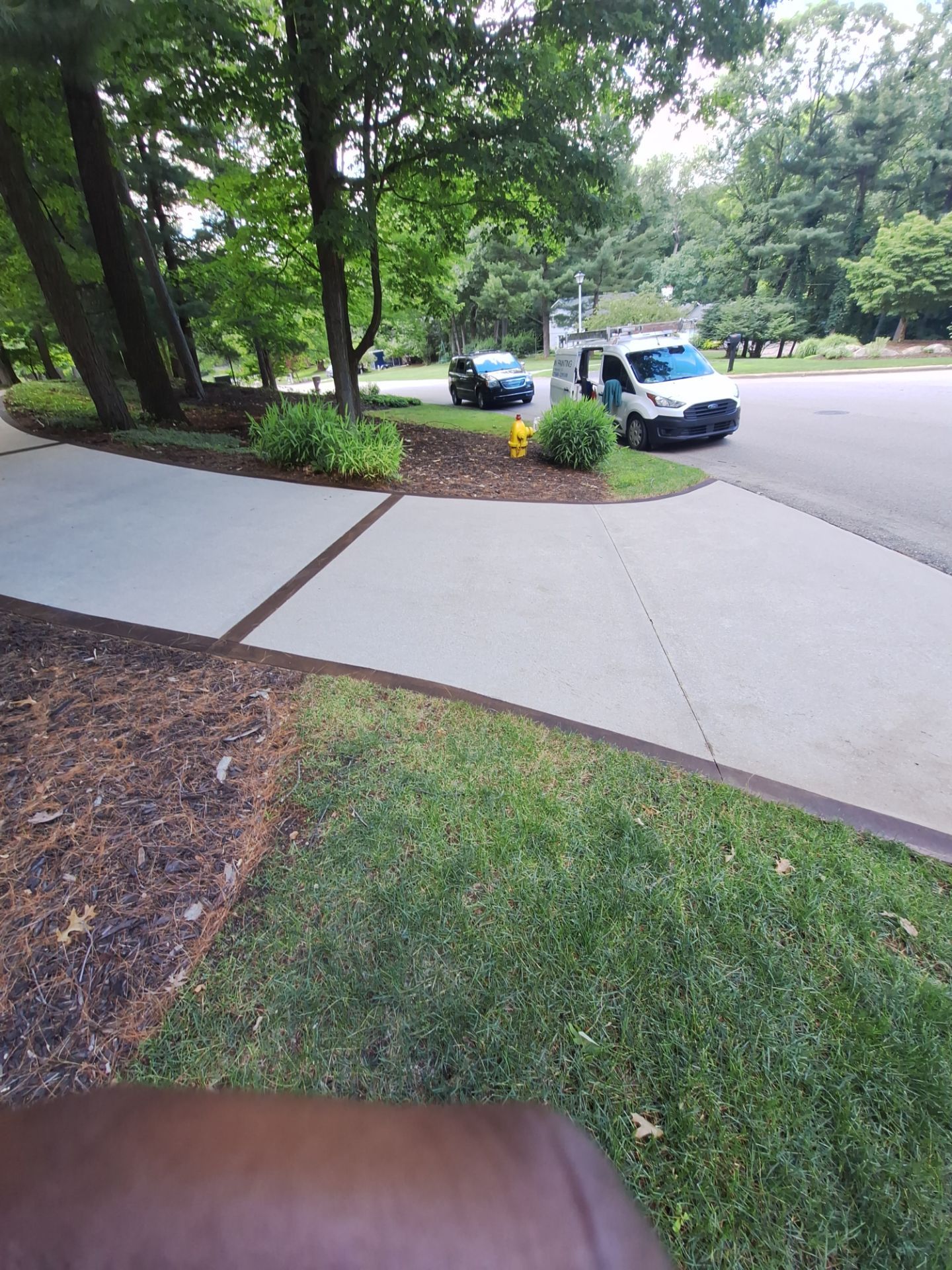 Concrete Driveway and Walkway Staining With Espresso Borders in Grand Rapids by Gordon Painting