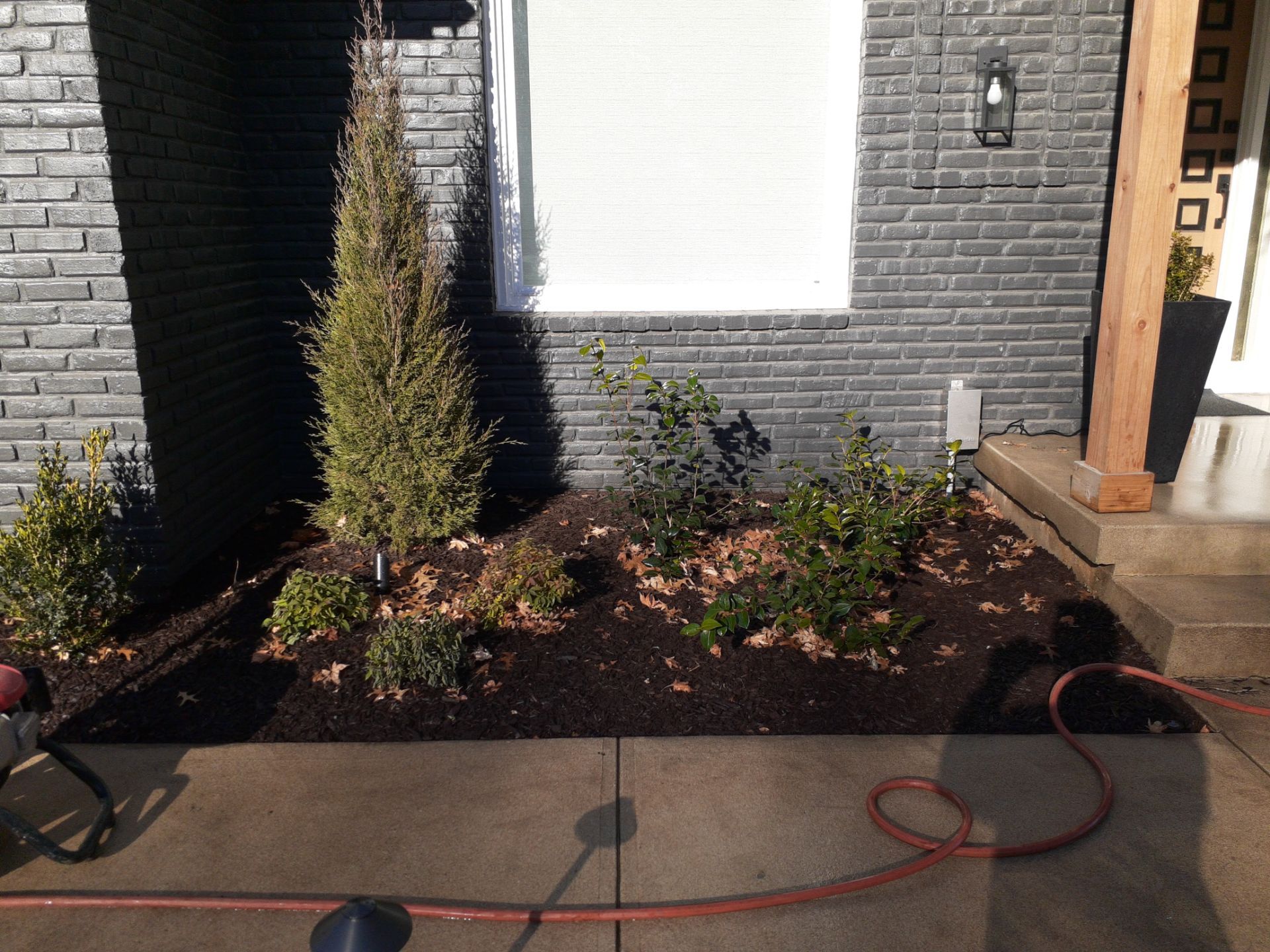 Entire Home Landscape and Retaining Walls by LAND ESCAPES LLC