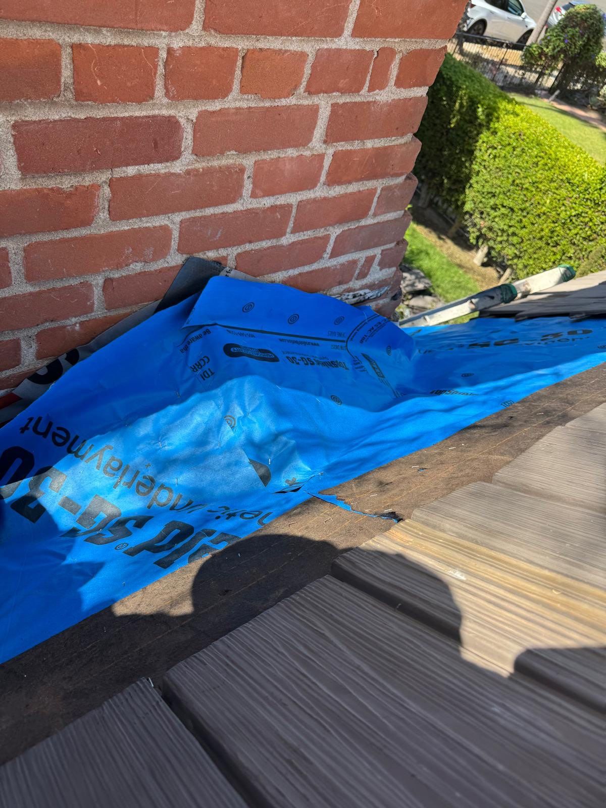 Composite Shake Roofing and Custom Chimney Cricket Installation in San Diego by Westmark Roofing