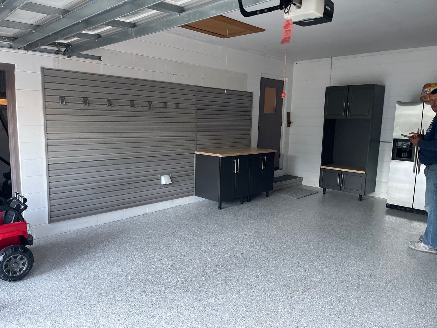 Garage with Cabinets in Gainesville, FL in Mount Everest by Cross Creek Concrete Coatings
