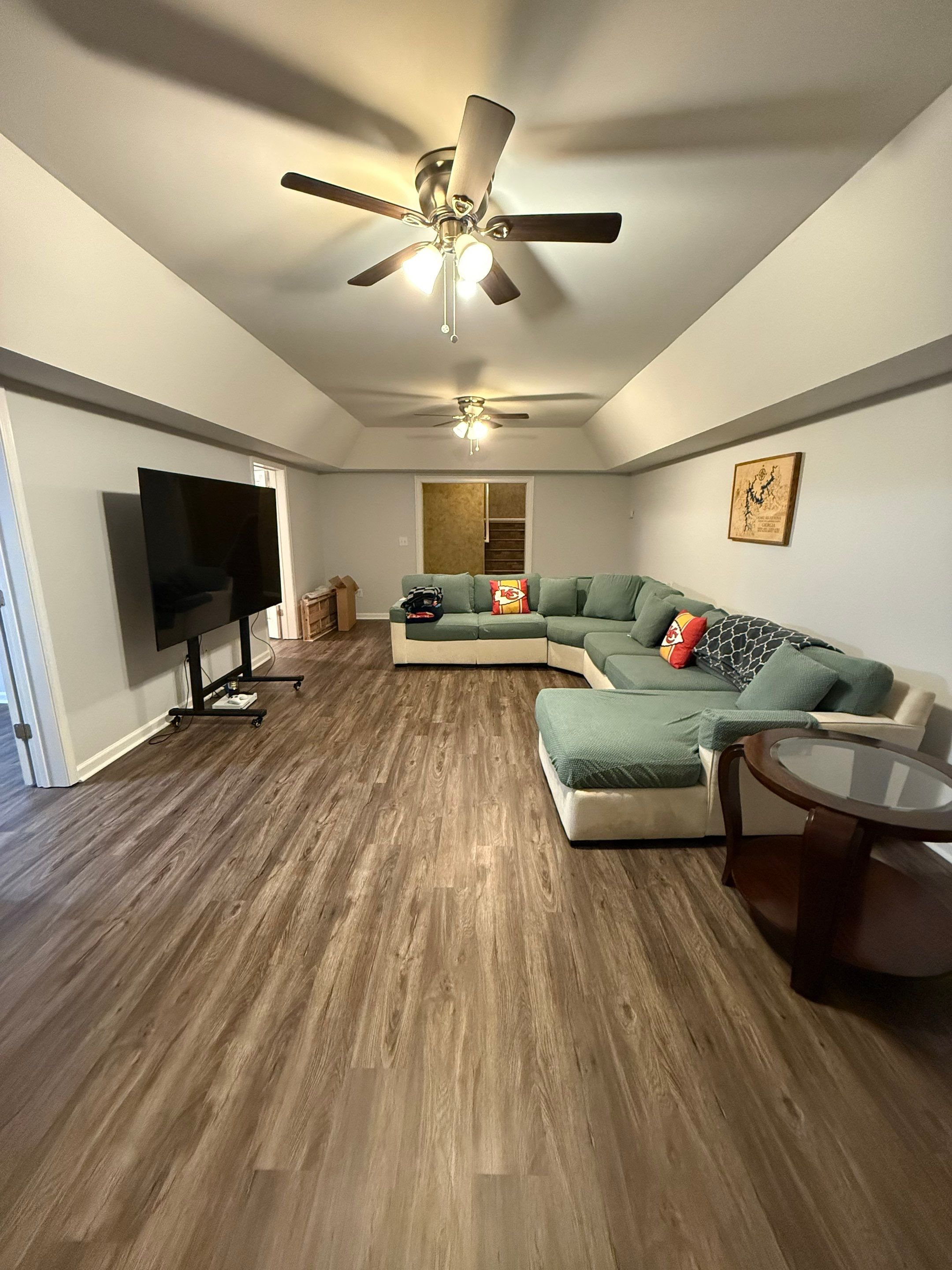 Full Basement Remodeling with Custom Flooring and Tray Ceilings in Marietta by Swift Home Renovations