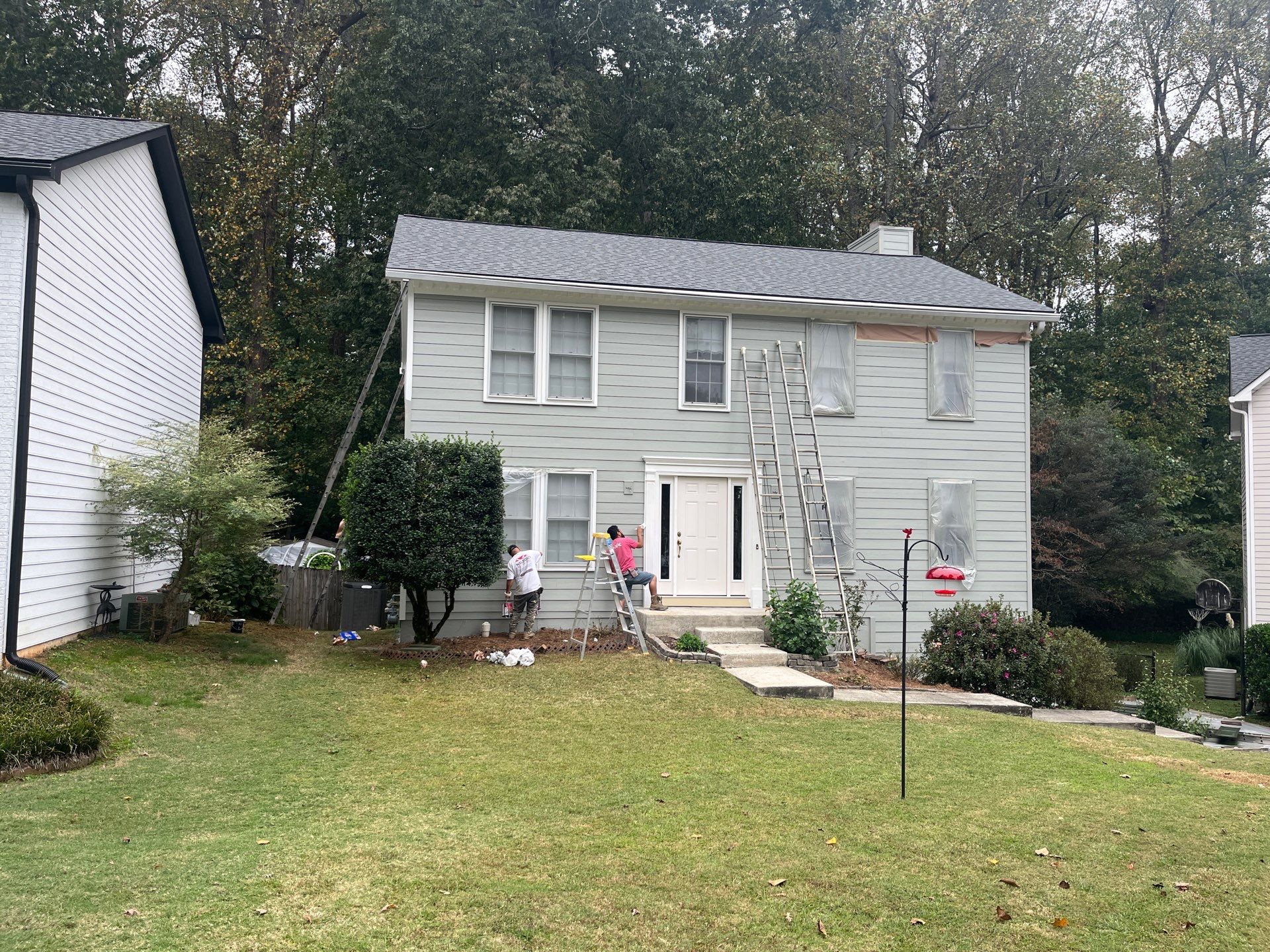 James Hardie Siding Replacement and Pressure Treated Pine Deck Resurface  by Nelson Exteriors 