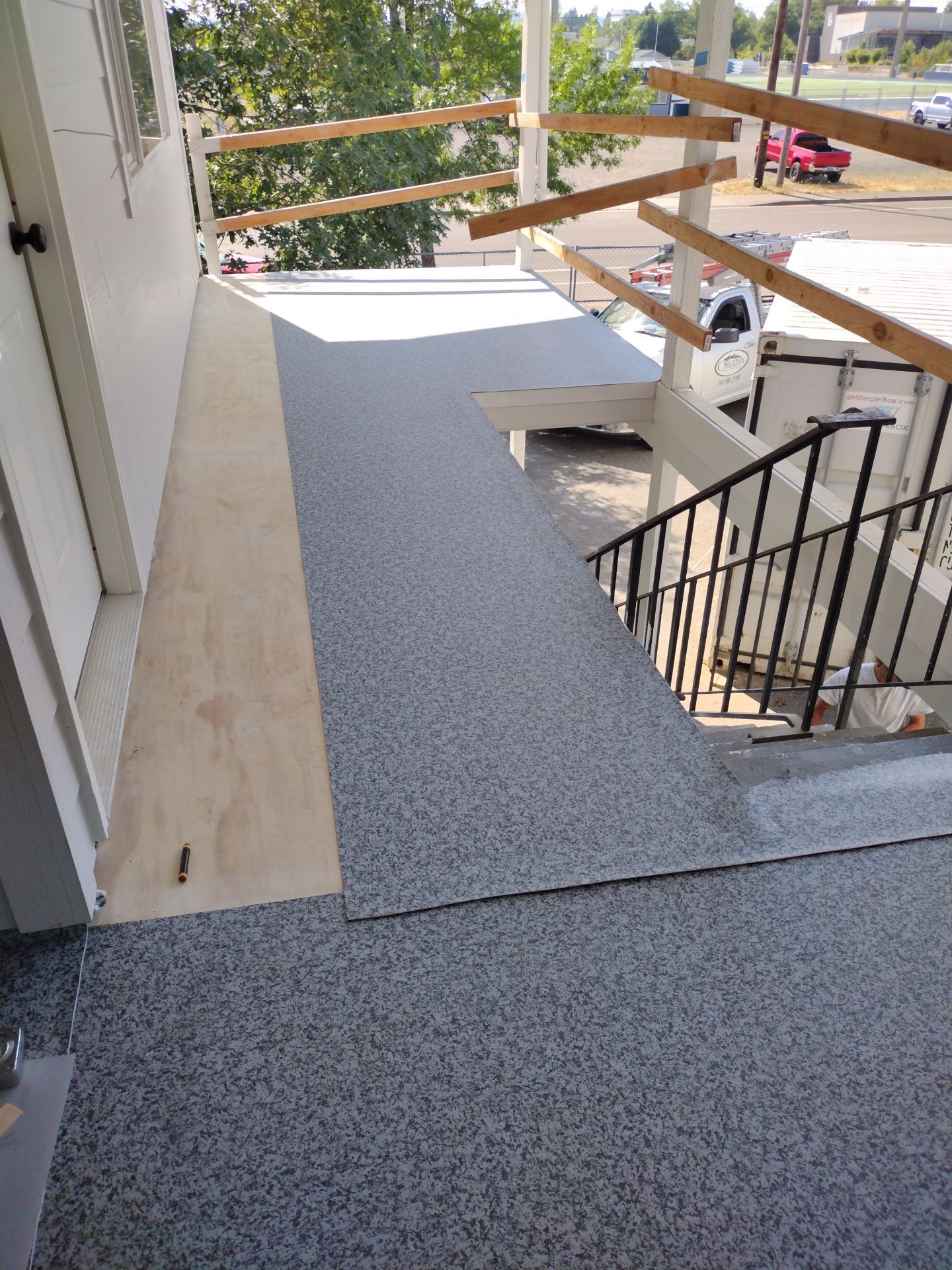 Dec-Tec Walkable Membrane using Dec-Tec (Color: Granite) by Orezona Building & Roofing Company, Inc.