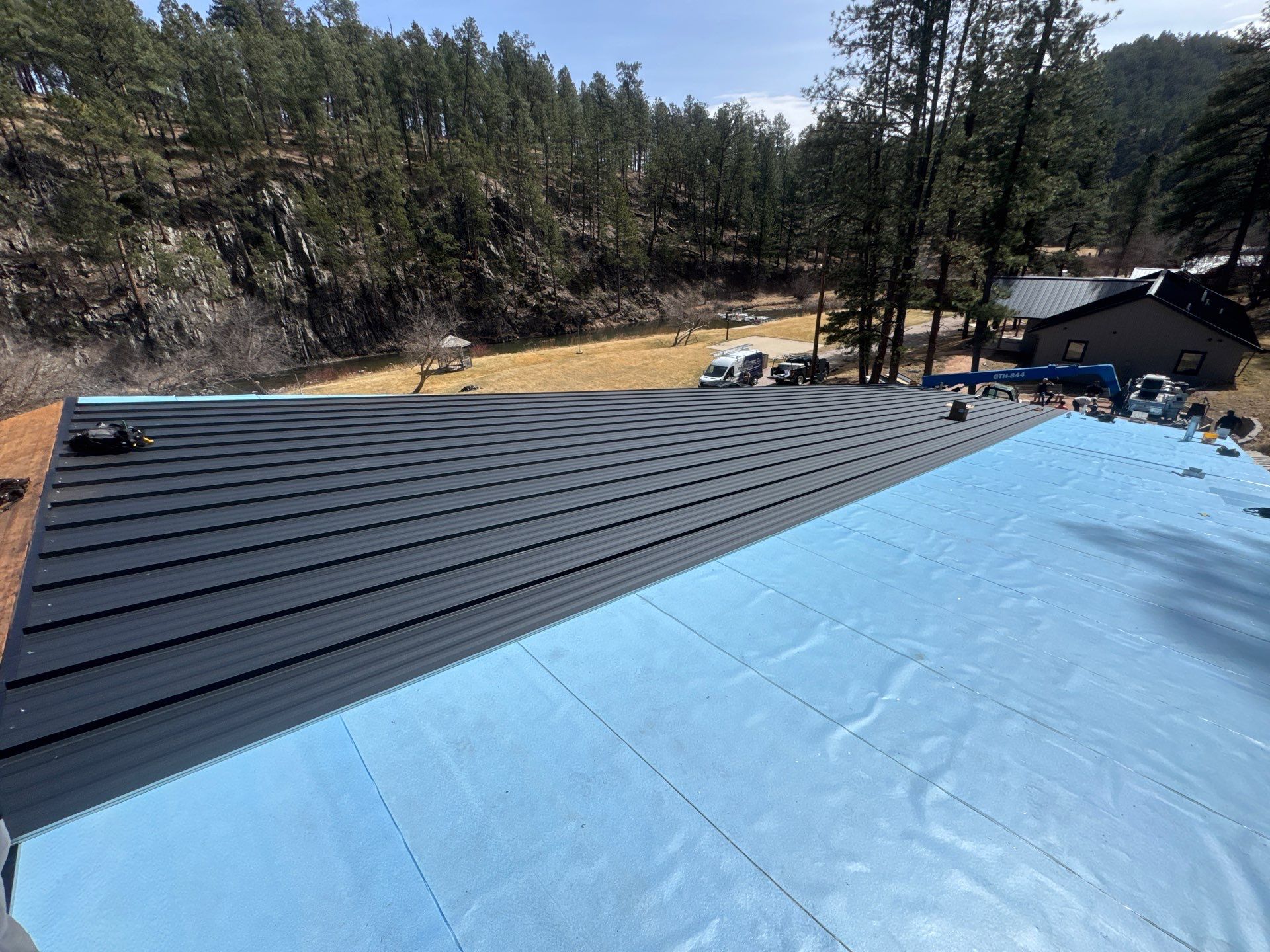 Residential Roofing Installation using Steel Roofing by Weather-Tite Exteriors LLC