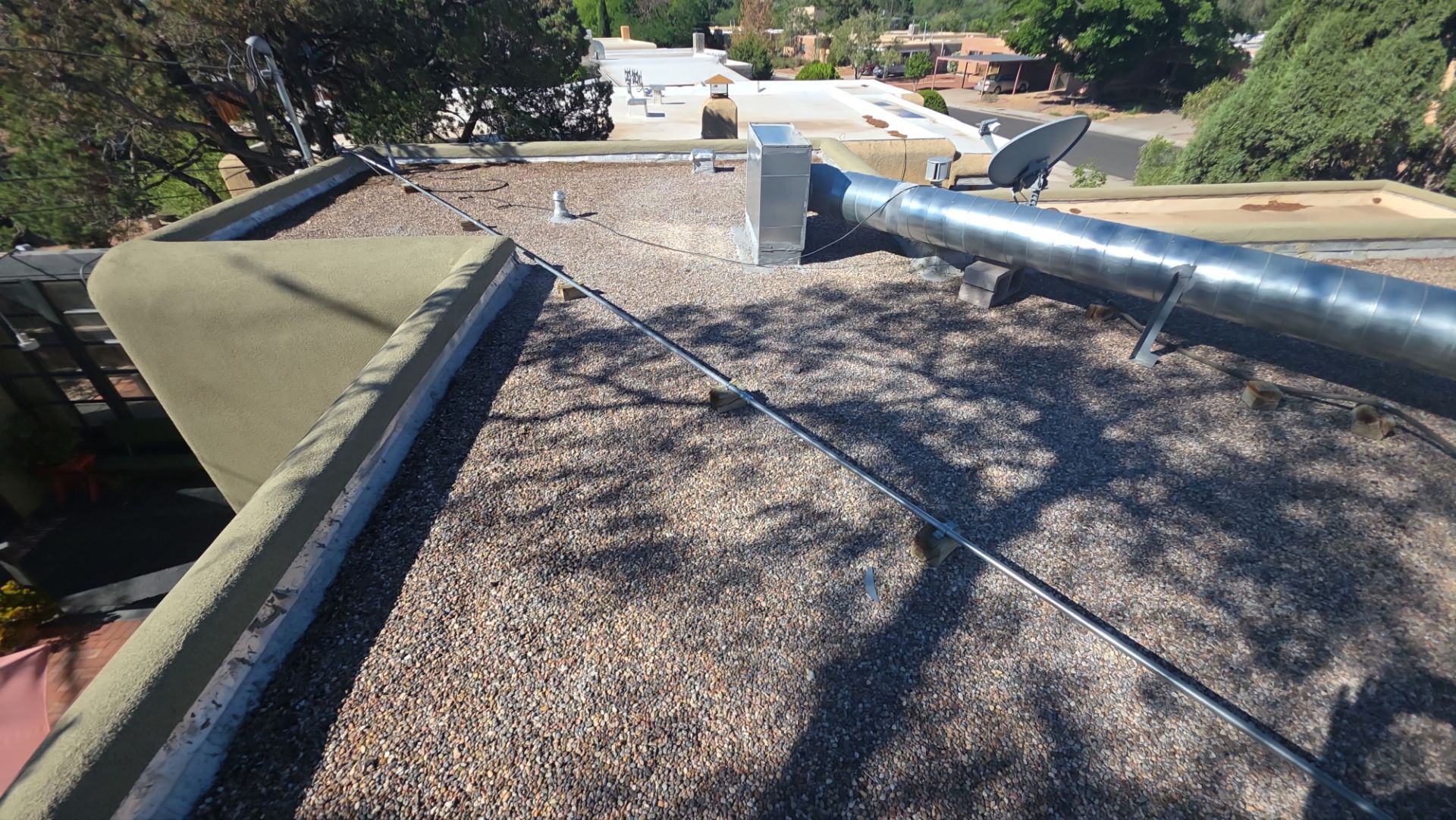 Tar and Gravel Roof Maintenance and Penetration Sealing in Albuquerque by Doyle Roof Masters Inc