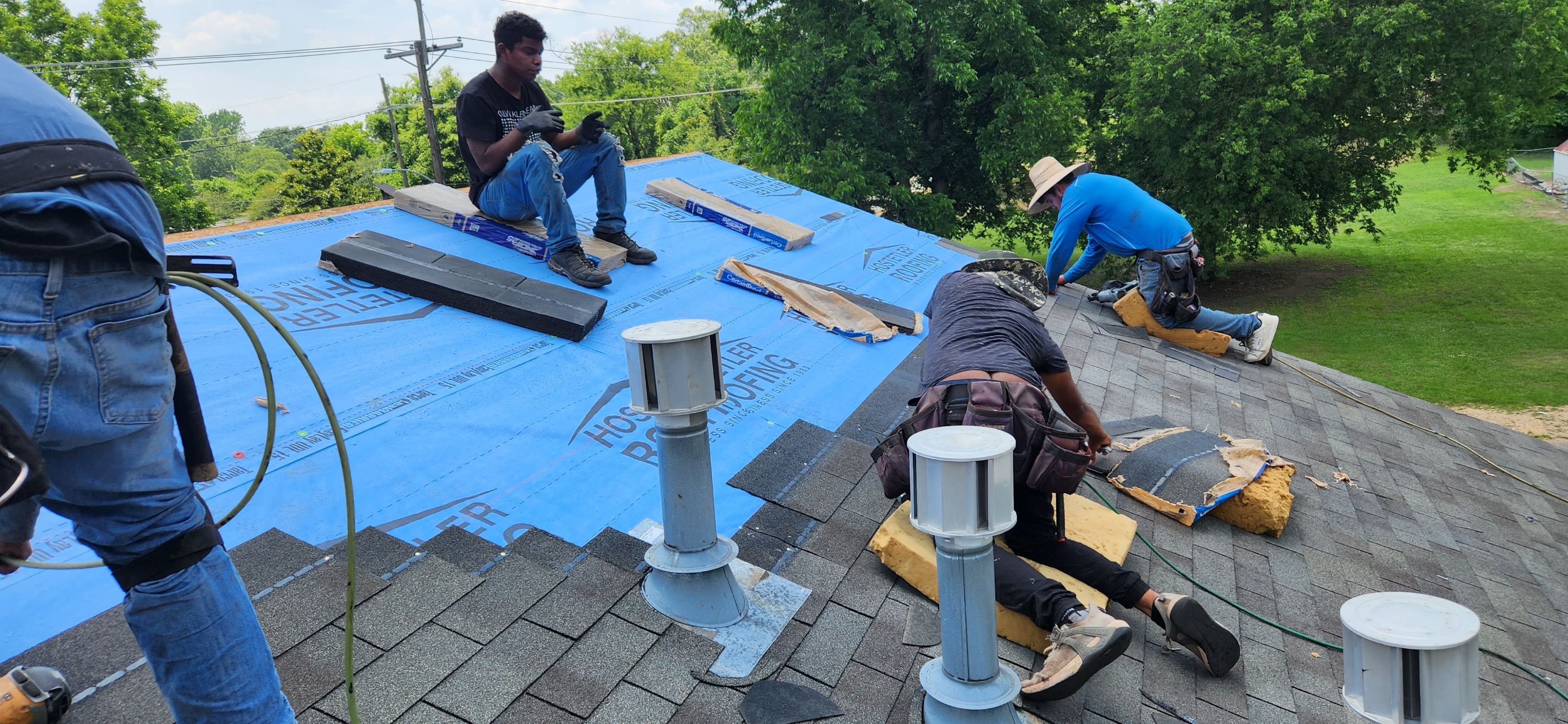 Storm Restoration Reroof: 25 Year 3-Tab Shingle by Hostetler Roofing