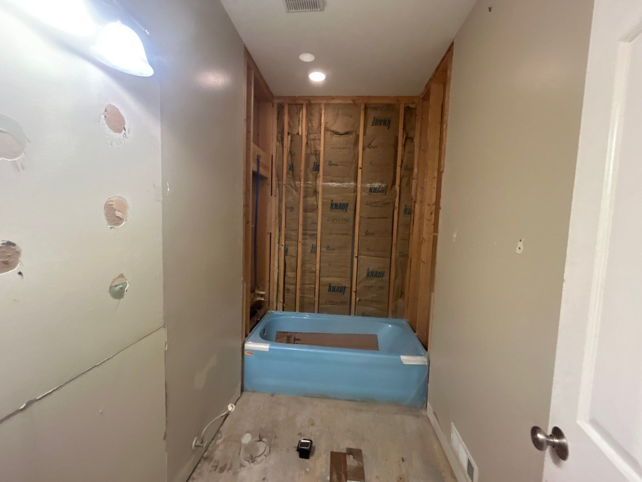 Tub Surround and Bathroom Floor by Footprints Floors Kentucky