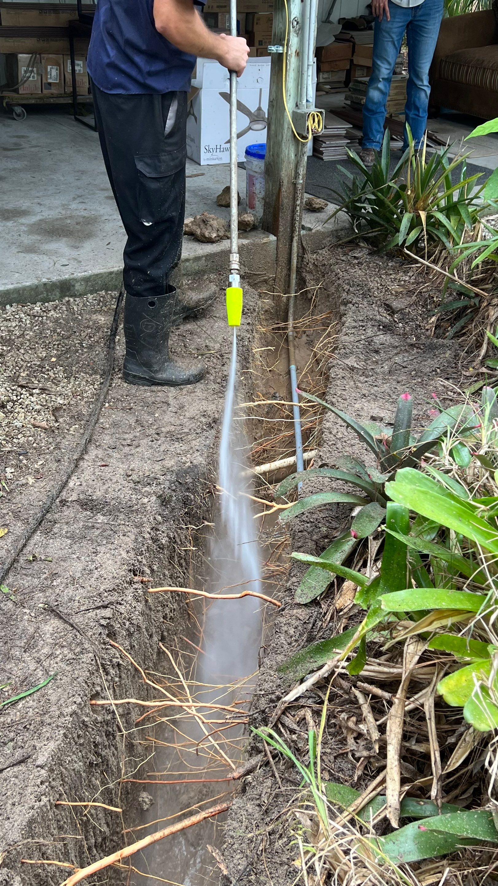 Hydro Excavating a Trench for Utility Lines by APS Power & Water