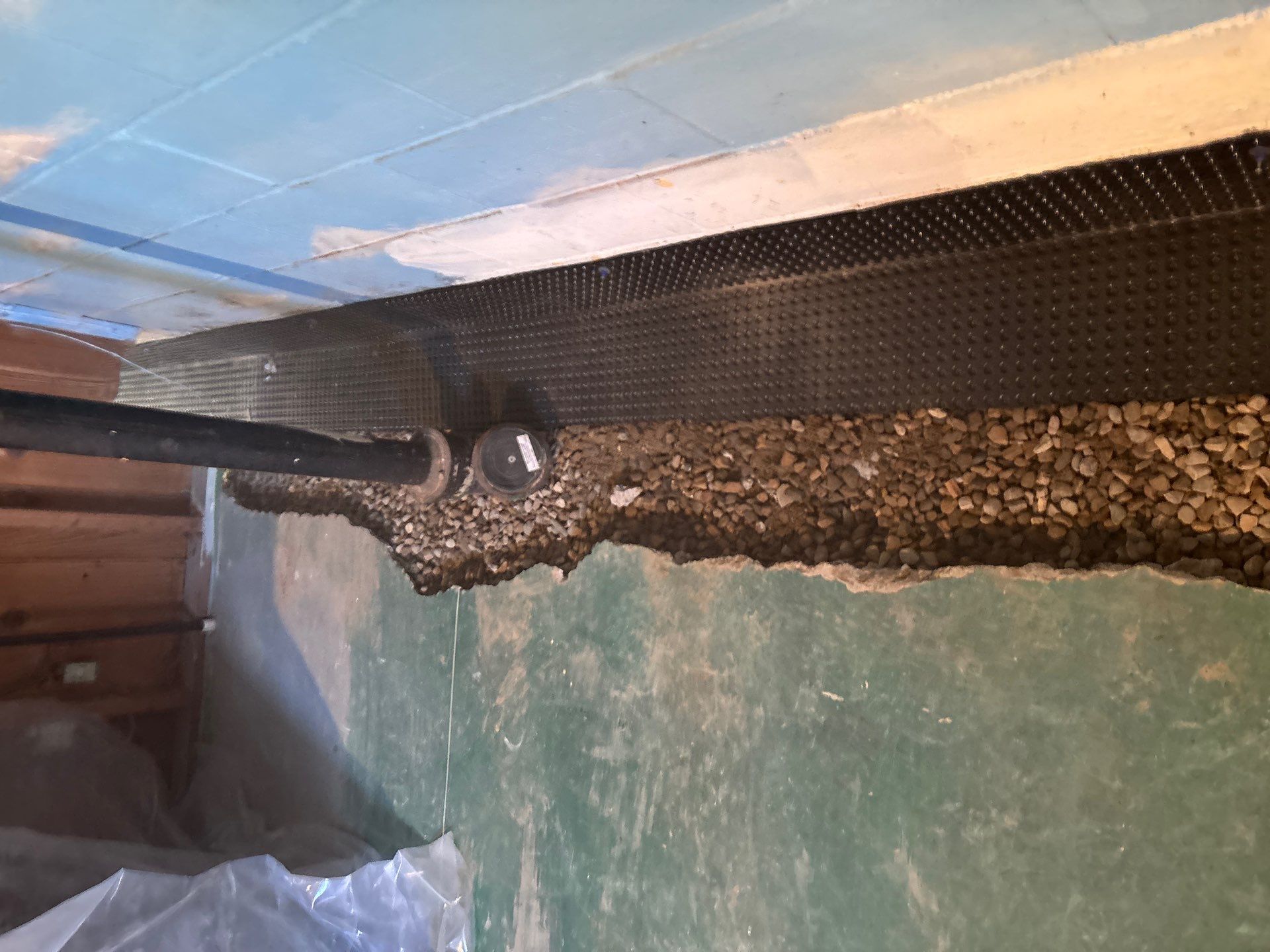 Completing the Connection for Lisa's Drain Tile System by Waterproofing Northeast