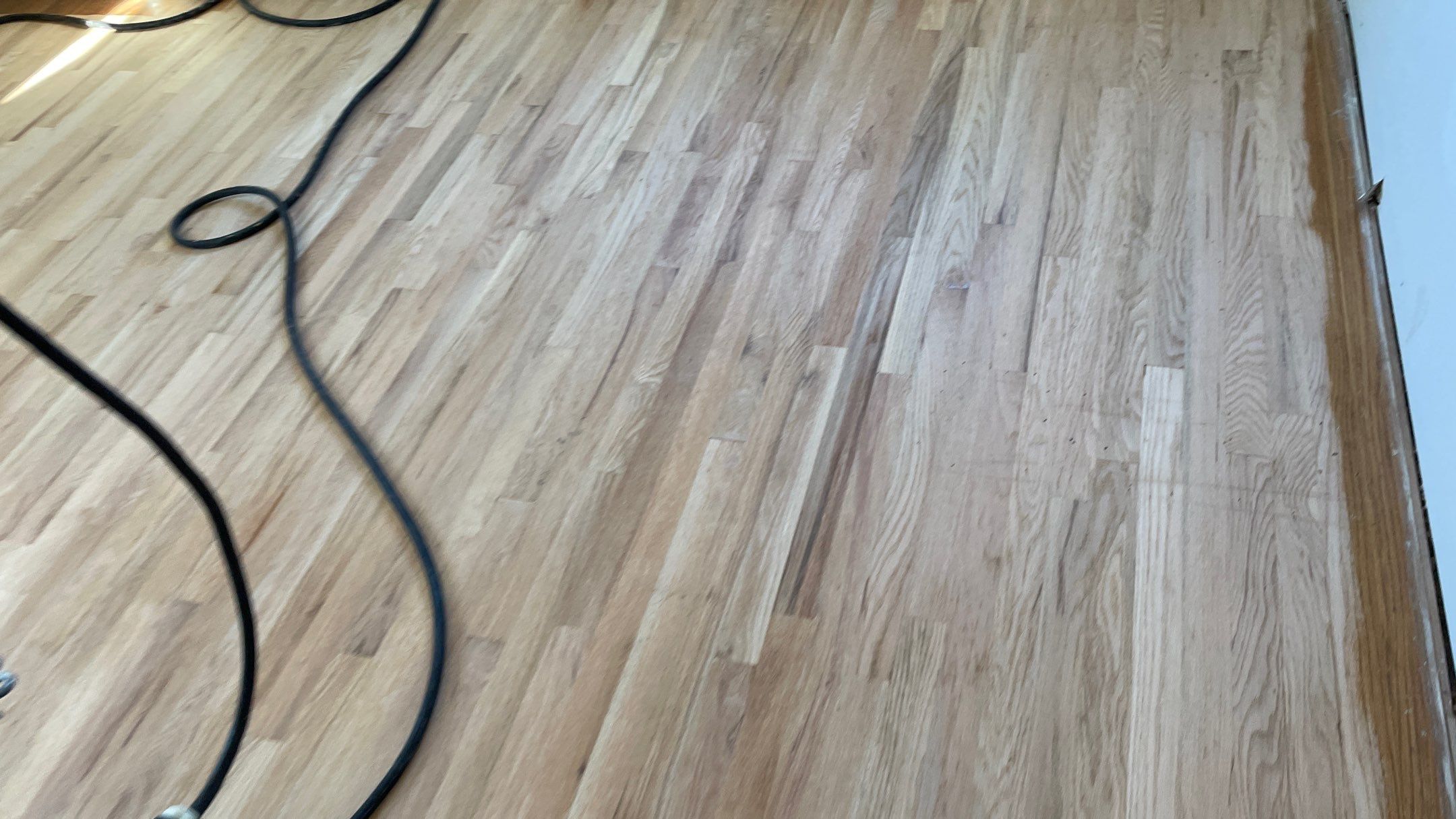 Remodeled Home with new tile floors, Showers and Refinished Oak Floors with stain and Waterbased Finish by Footprints Floors of Coastal Carolina