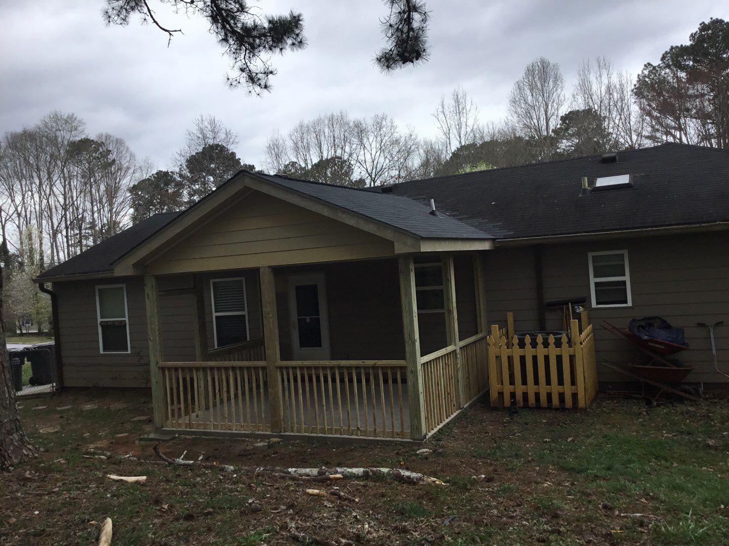 Screened Porch Construction with Vaulted Wood Ceiling in Douglasville by Swift Home Renovations