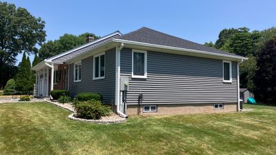 Refreshed Siding with Cert Monogram D/4 x 16'8" clapboard Charcoal Gray & Cert Monogram D/4 x 25' clapboard Charcoal Gray