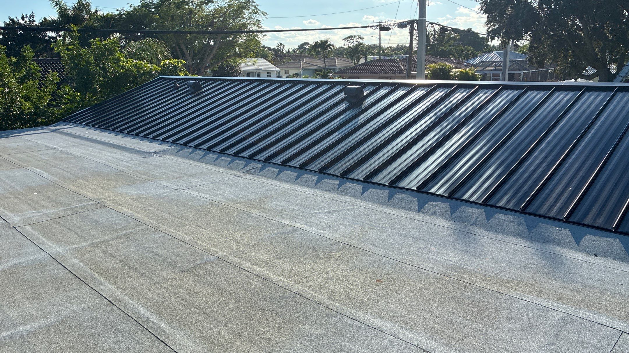 Residential Roofing Installation using 1" Nail strip metal roof by BLUES BROTHERS ROOFING