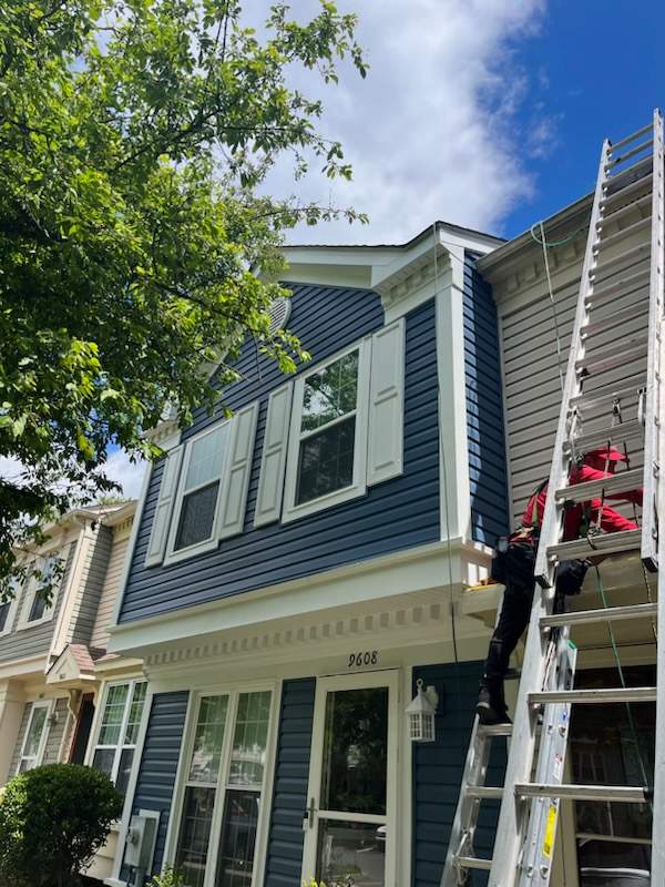 Beautiful in Blue - Mastic Siding Replacement by American Home Contractors