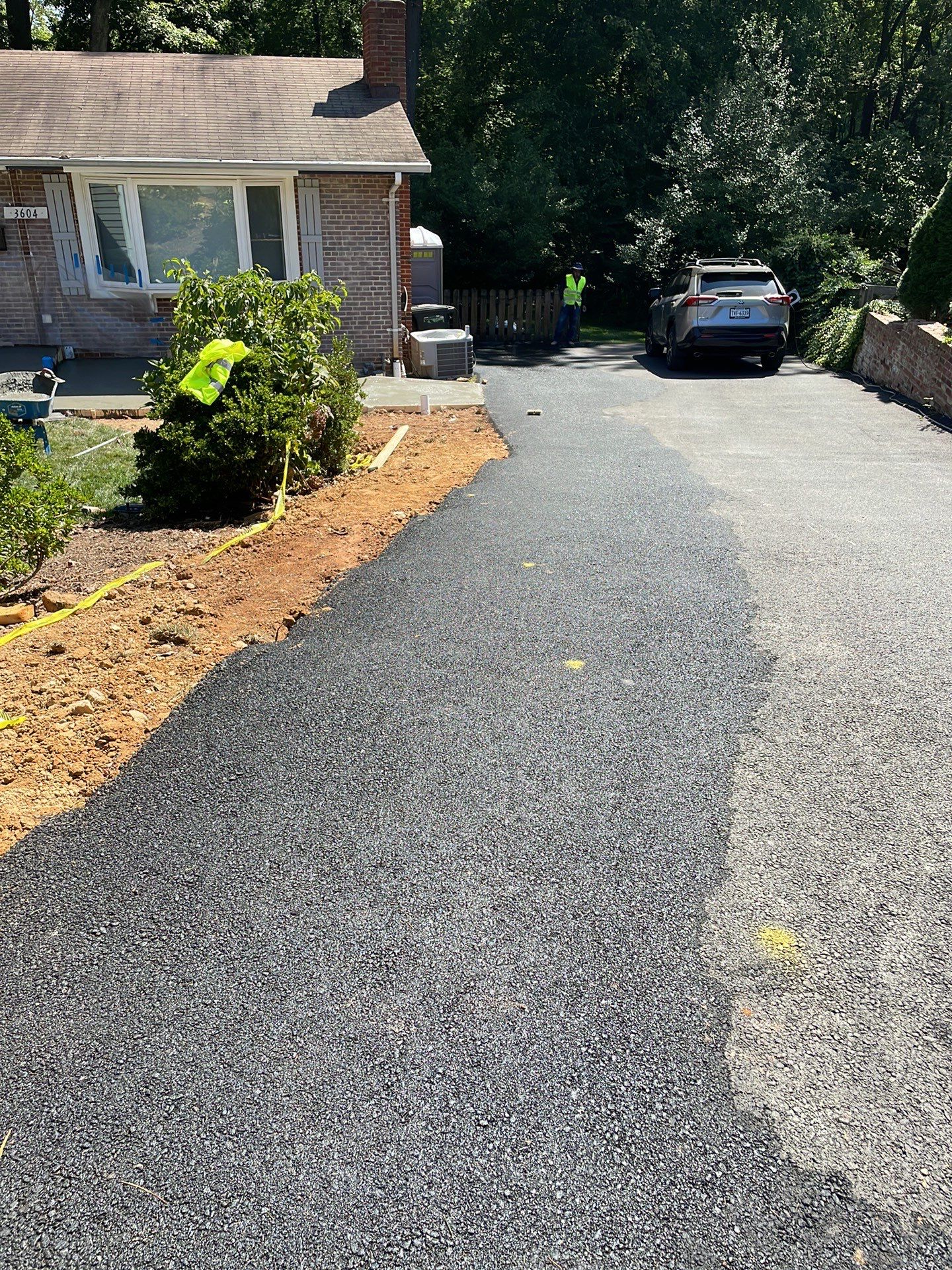 New walkway with stairs and a new front porch by Fairfax Contractors, LLC